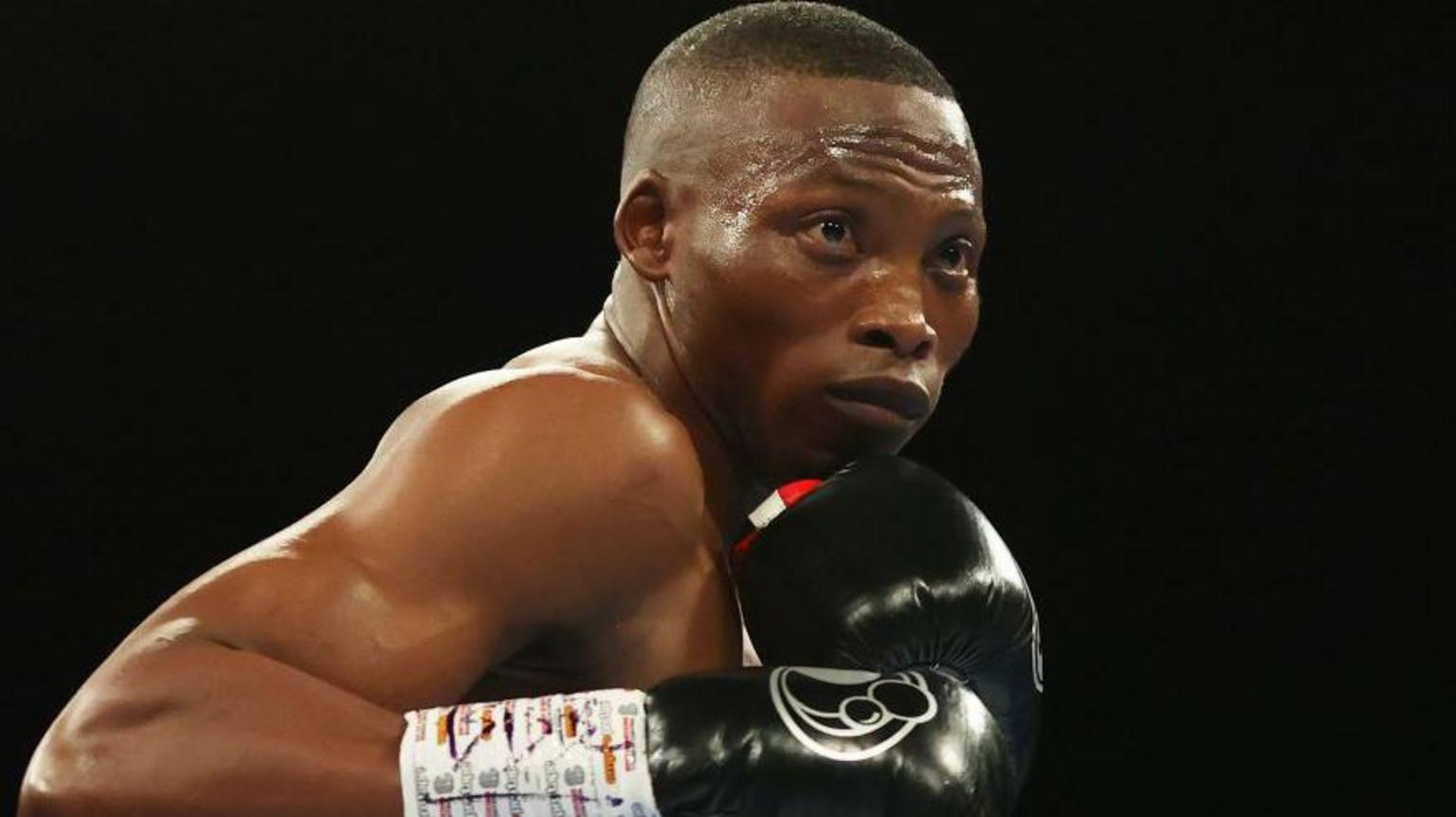 Four arrested over boxing champion's murder in South Africa