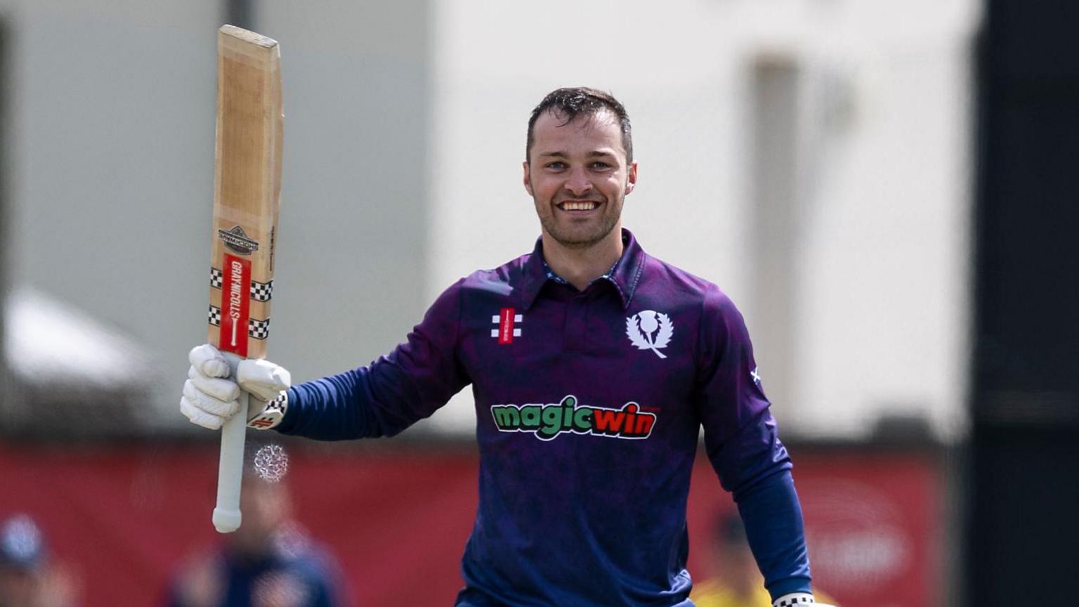 Michael English celebrates a maiden century for Scotland