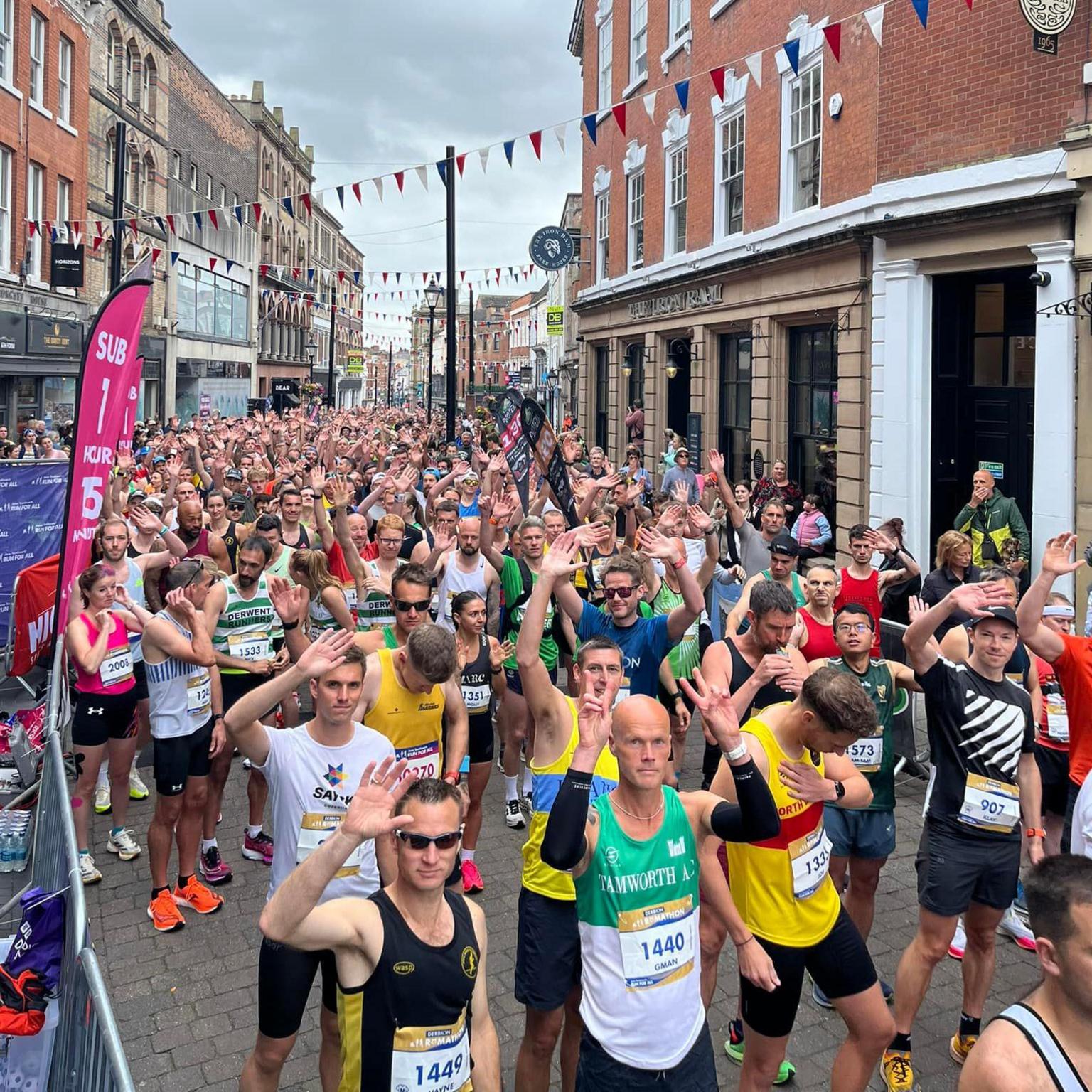 Runners taking part in a road race through Derby