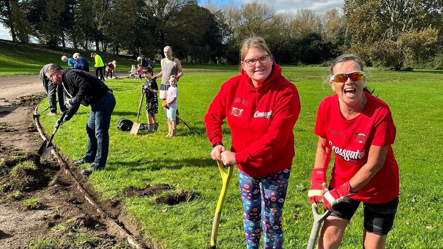 Volunteers unearth the athletic track at Temple Newsam