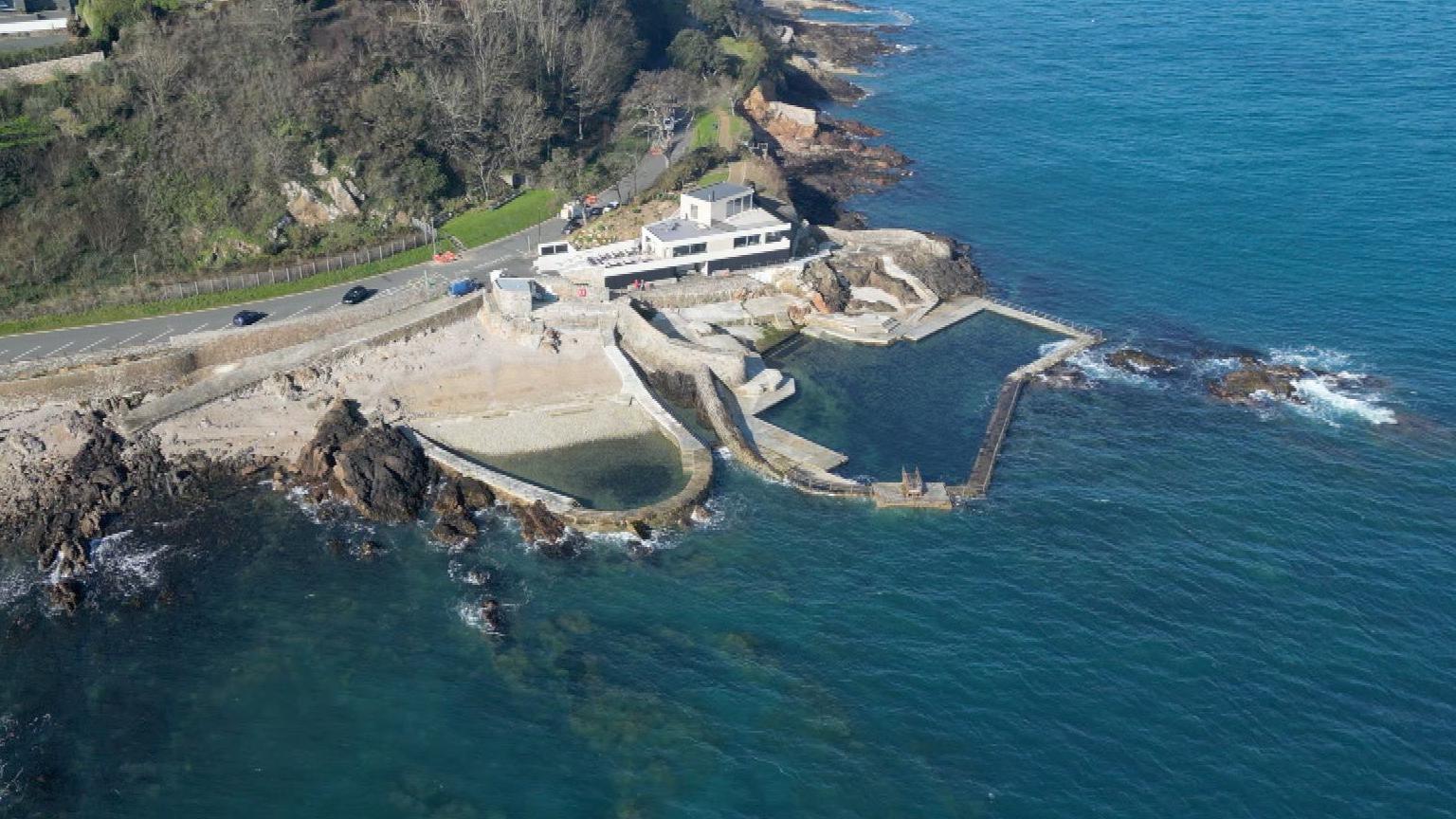 An aerial view of La Vallette bathing pools in Guernsey on a sunny day