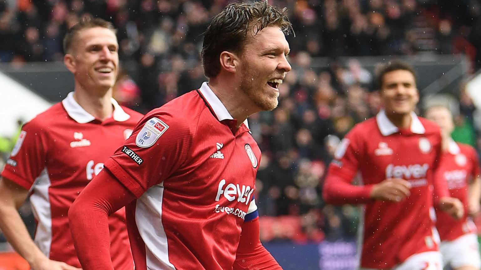 Rob Dickie celebrates scoring for Bristol City against Swansea City