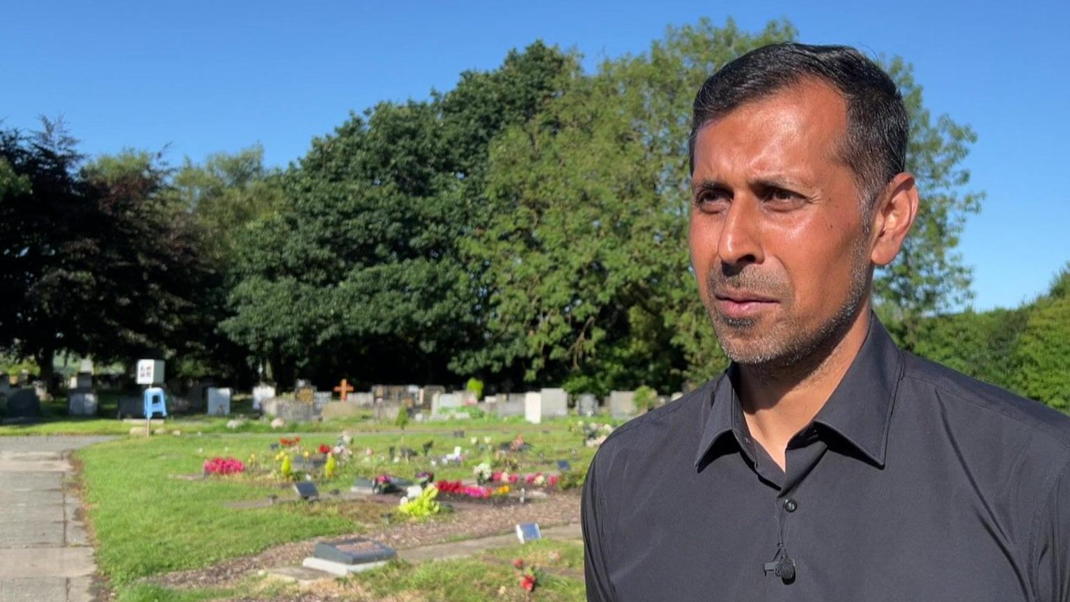 Councillor Afrasiab Anwar in Burnley Cemetery