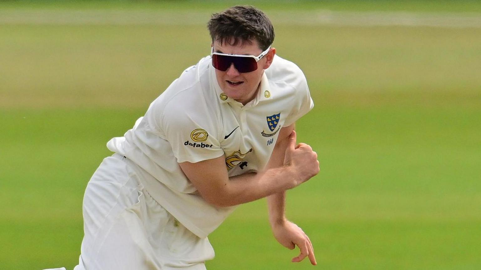 Jack Carson bowling for Sussex