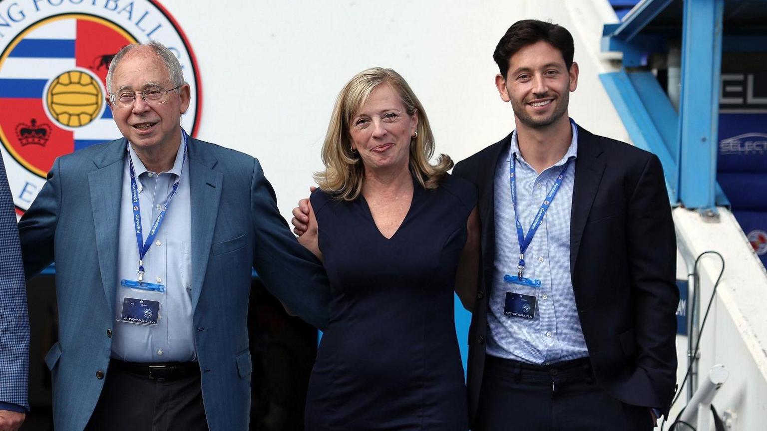From left to right, Rob Couhig, Missy Couhig and Joe Jacobson pose for a photo