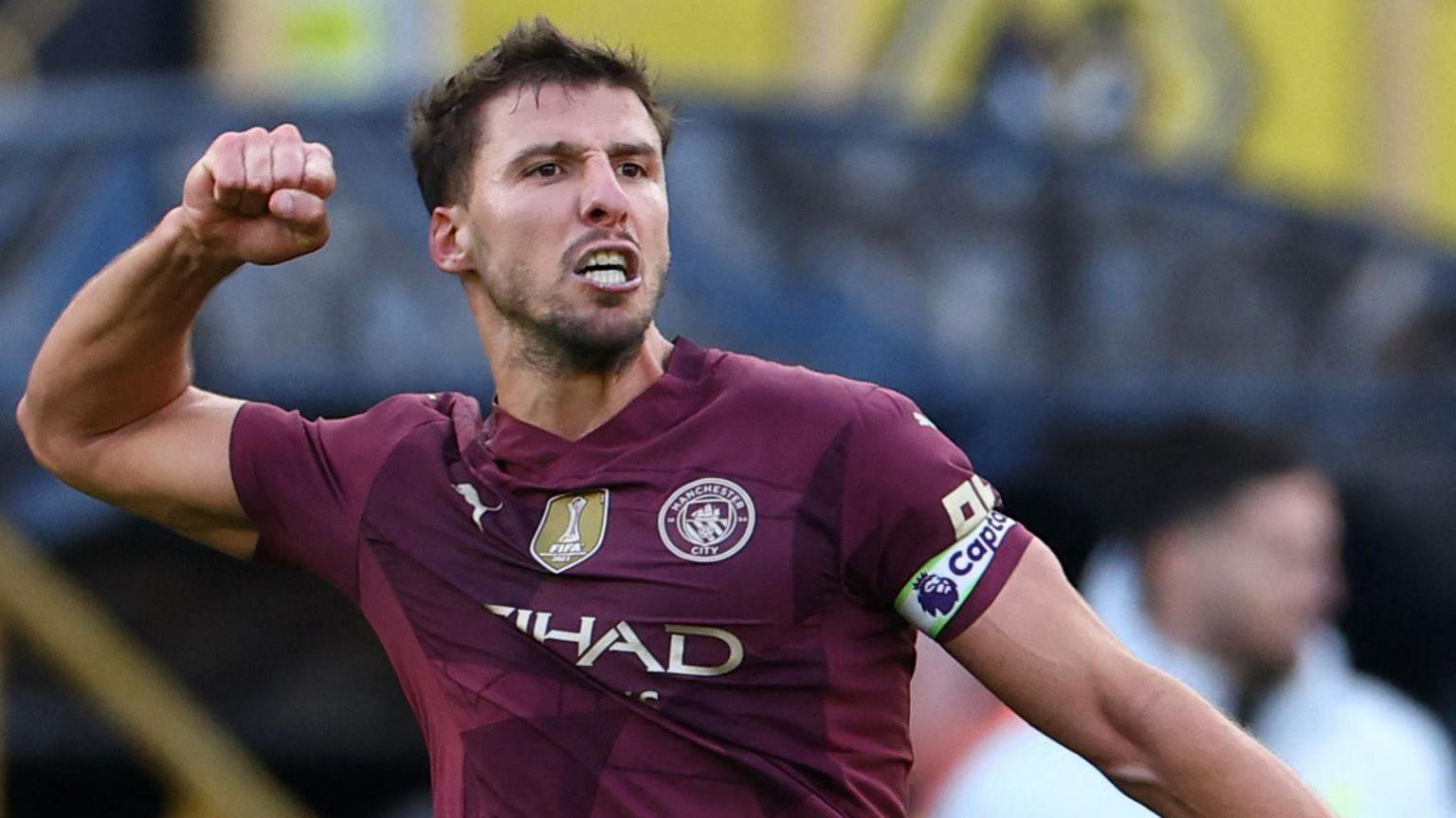 Ruben Dias celebrates a Manchester City goal at Wolves