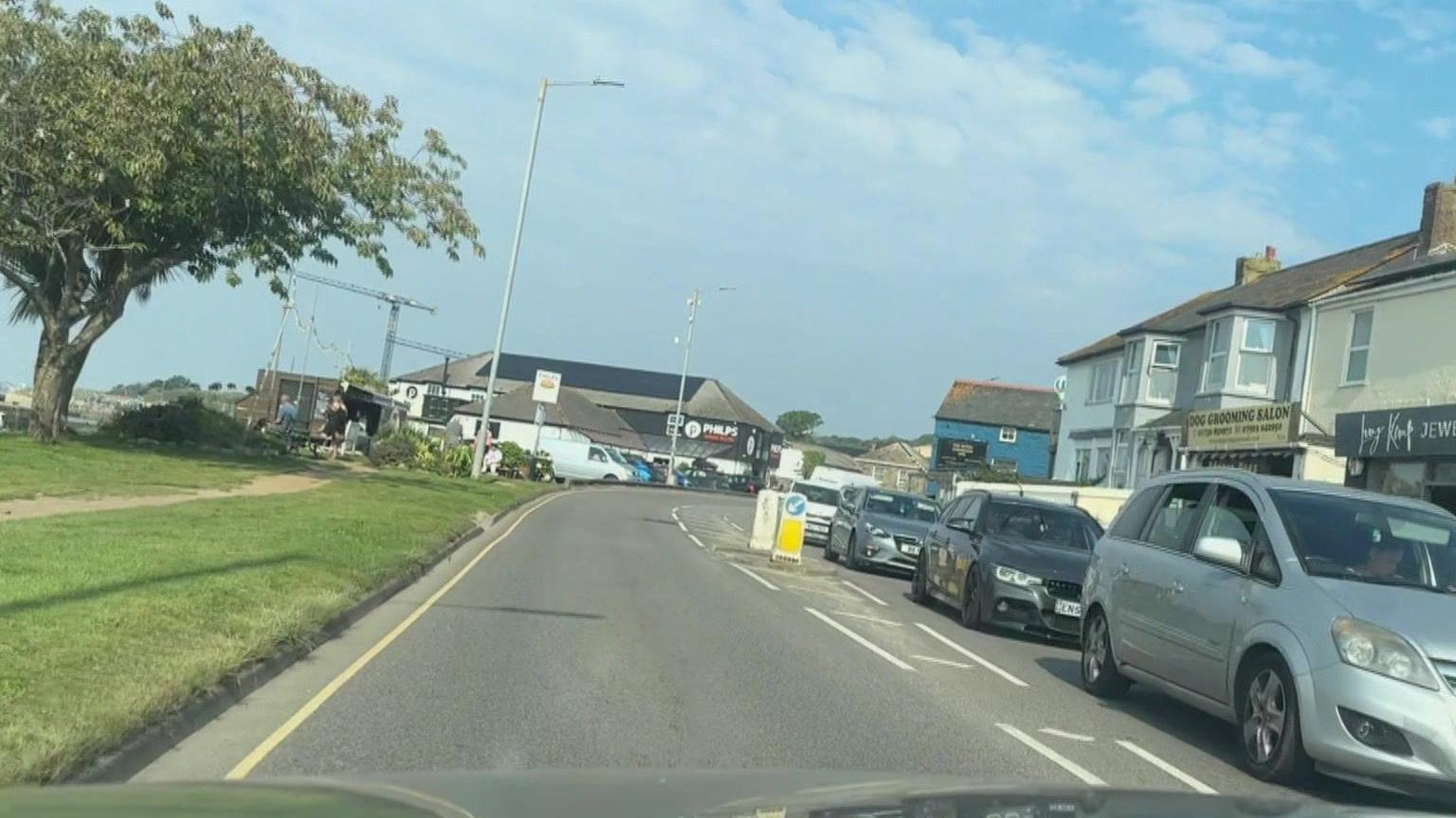 Cars on a road in Hayle in Cornwall.