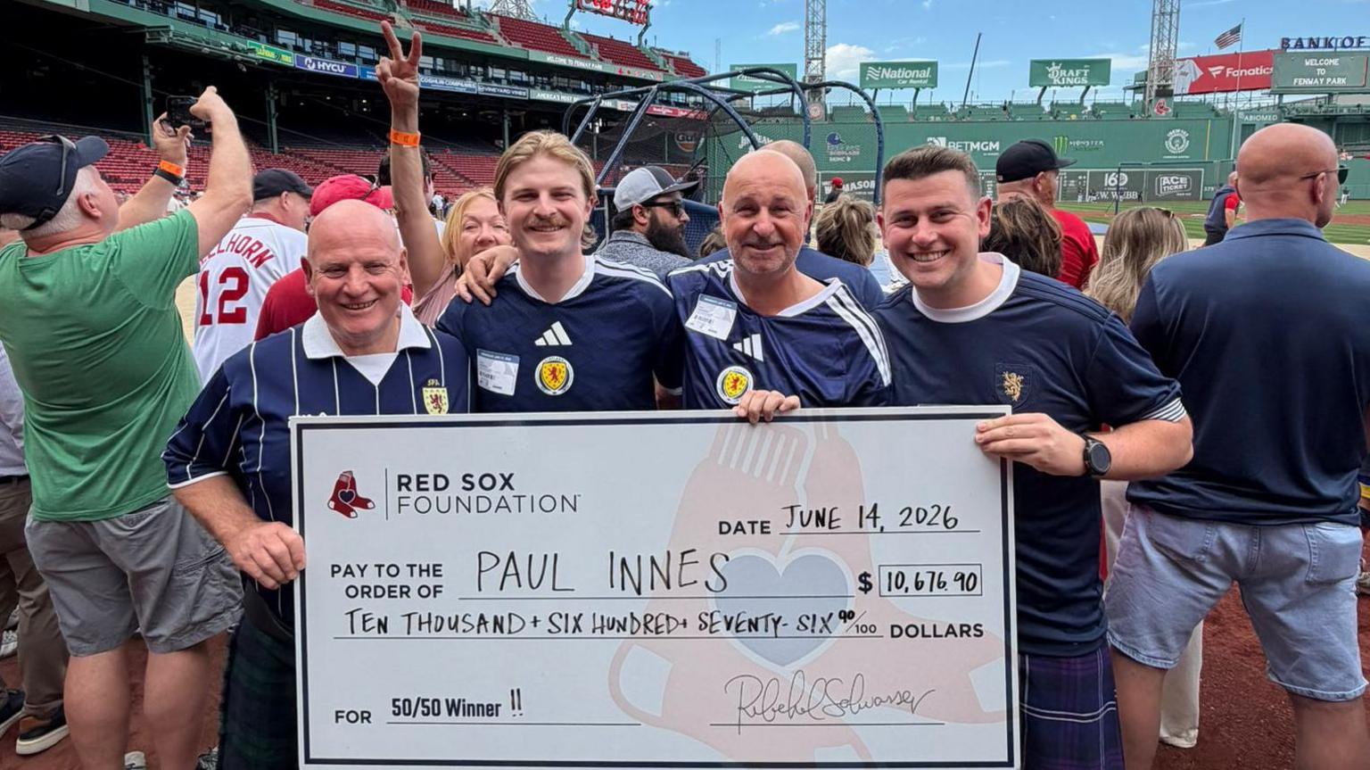 Scotland supporters with Boston Red Sox cheque