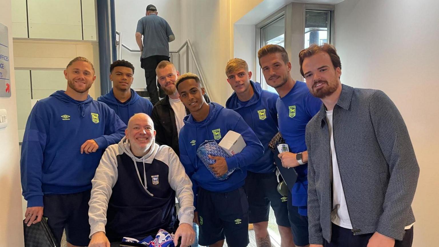 Scott Billison with friend Mark Wall and Ipswich Town players before the Cardiff City match in September