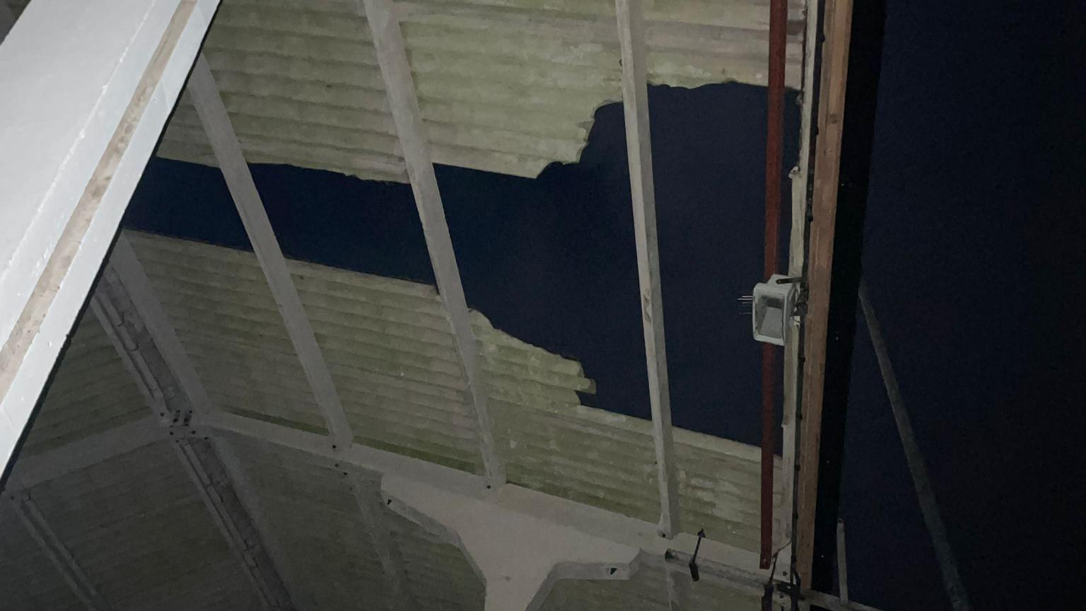 Hole in roof of grandstand at the Mennaye Field