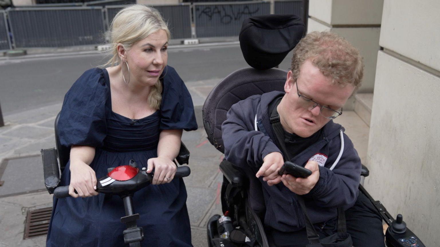 Nikki Fox with Nicolas on a pavement in Paris