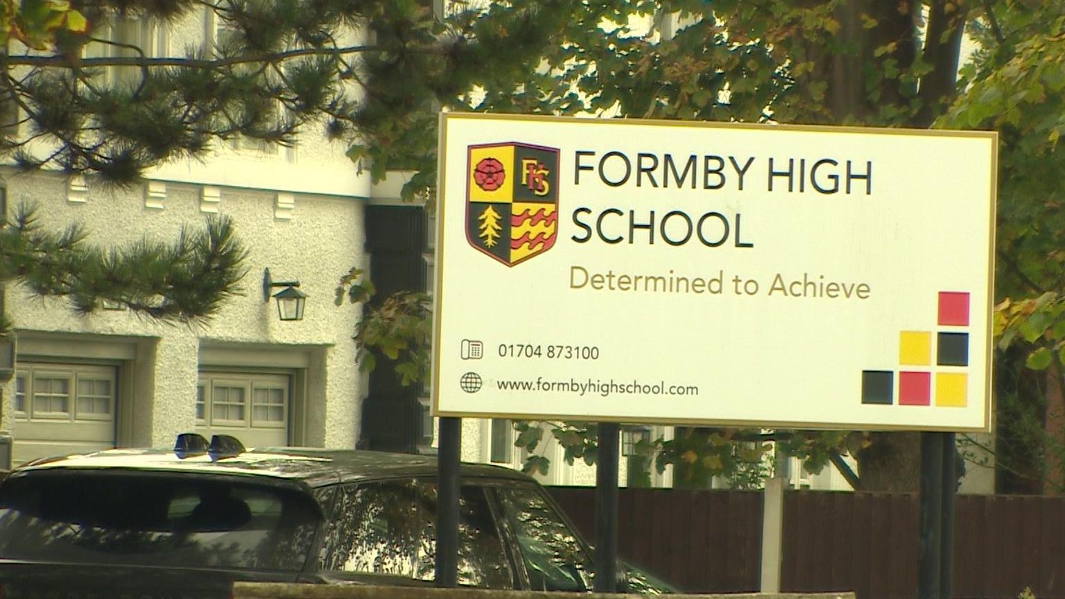 Formby High School exterior shot of school sign