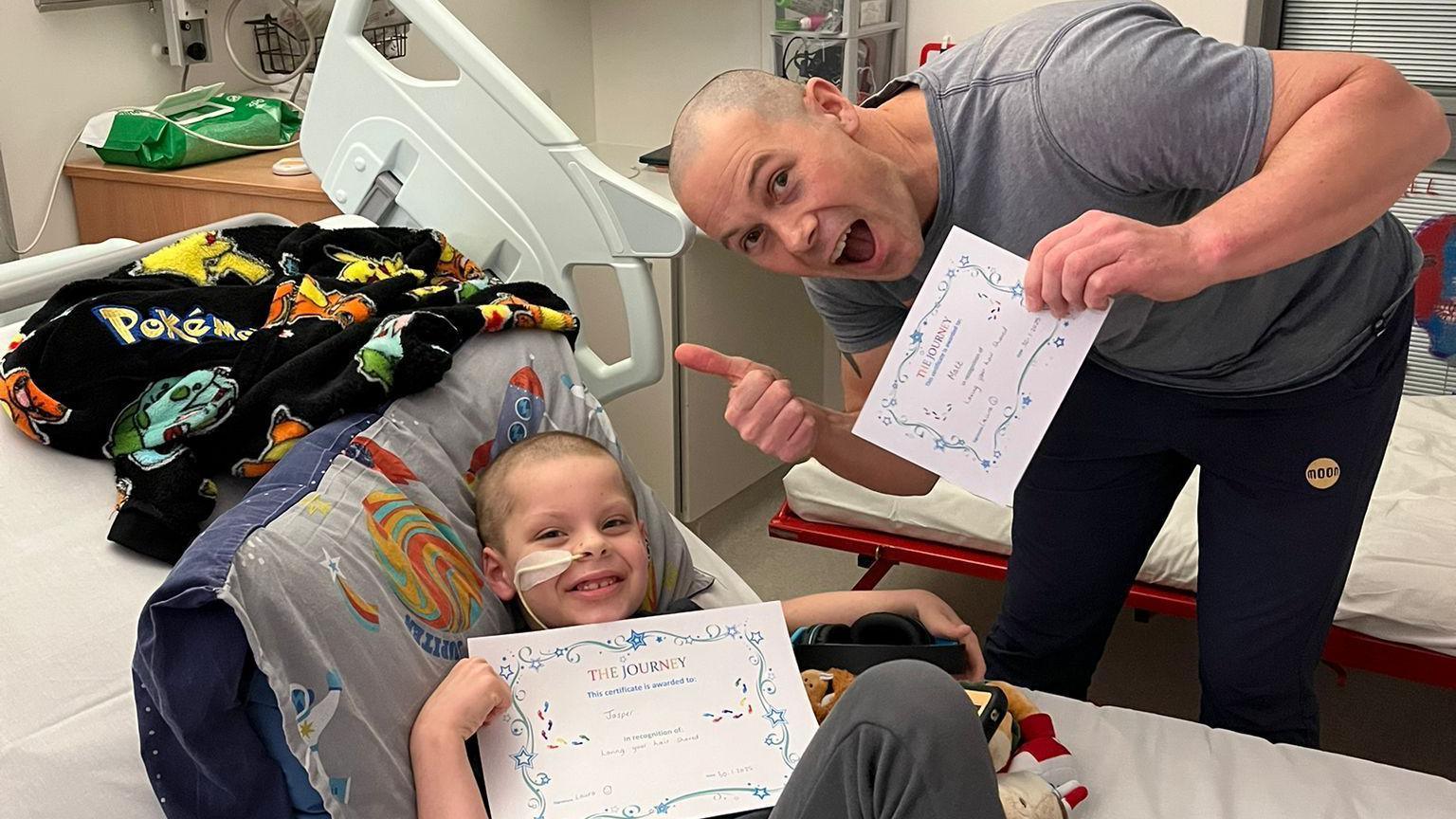 Jasper Hodgson-Smith and his father Matt Hodgson-Smith pictured in a hospital room. 