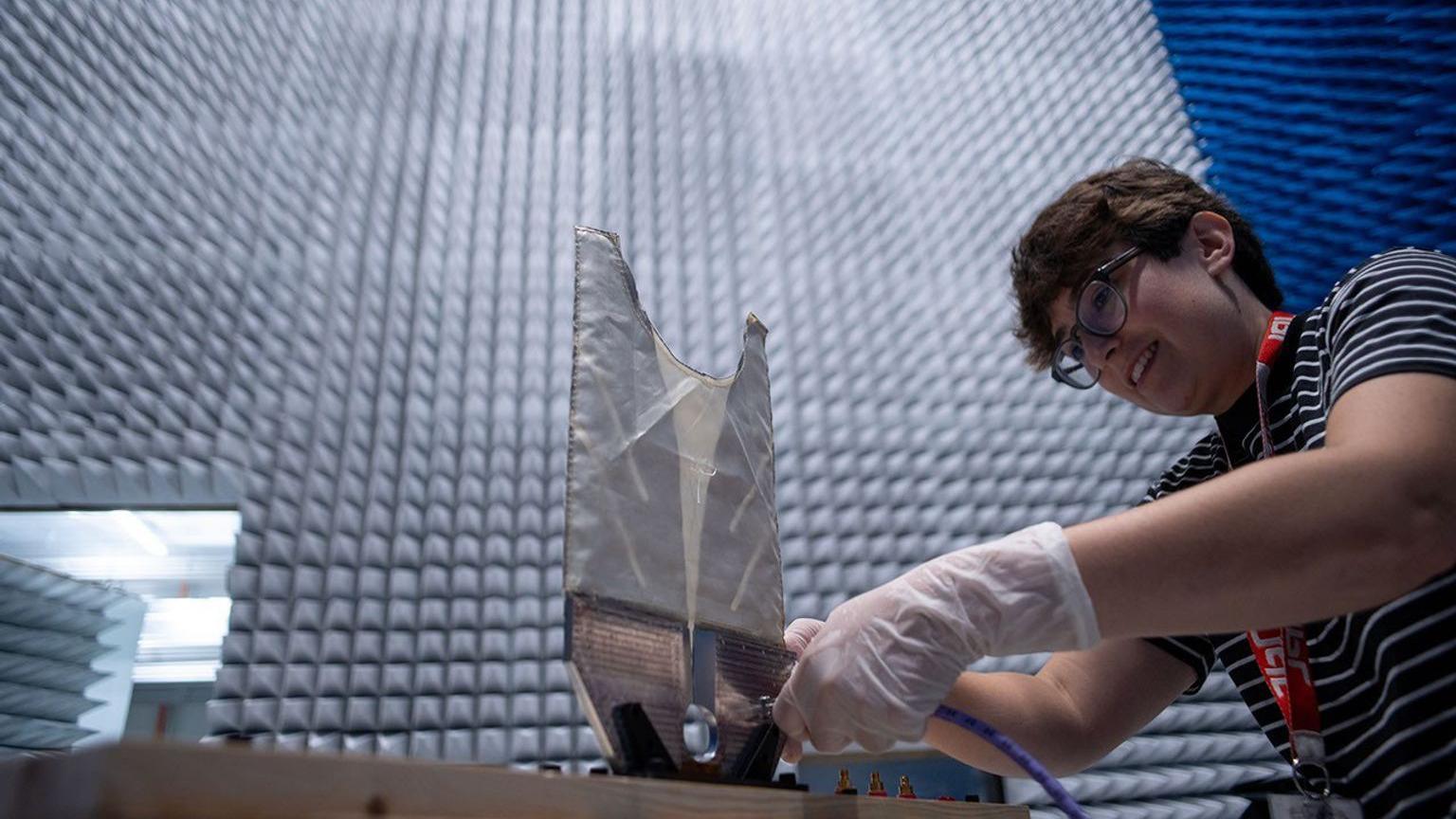 A radar engineer works on a test antenna for the SkyFall mission’s ground-penetrating radar in the electromagnetic interference chamber at JPL.
NASA/JPL-Caltech