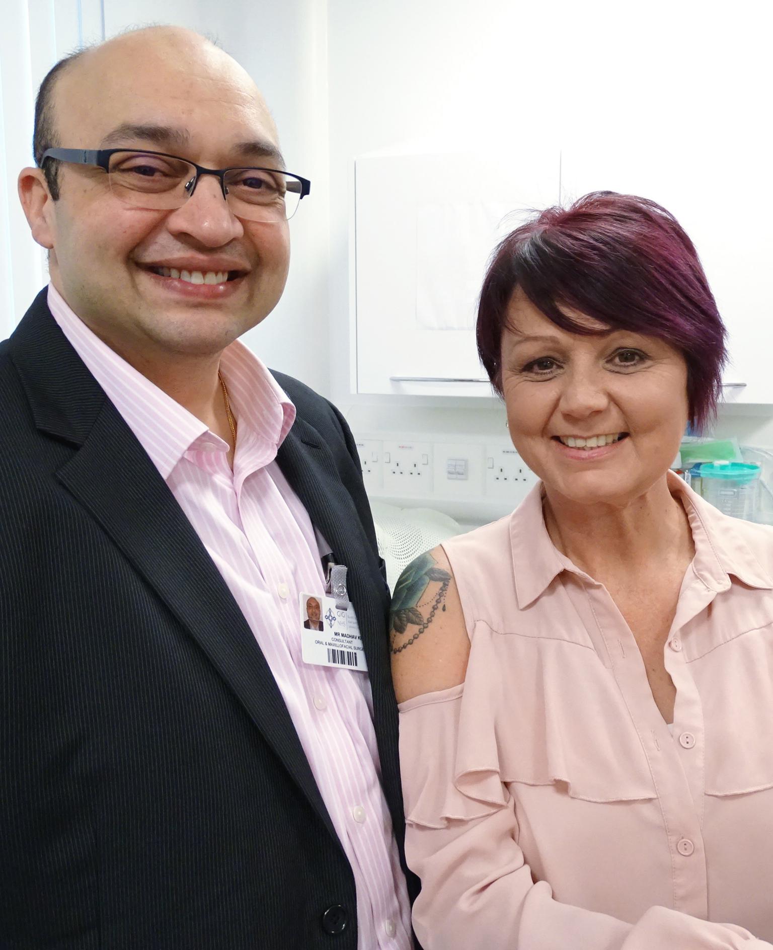 A photo of Debbie Hawkins and consultant surgeon Madhav Kittur