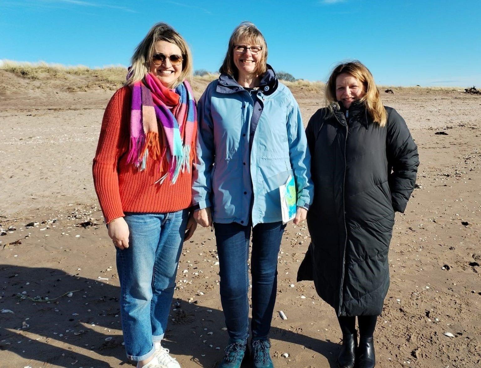 Friends Kelly (left) and Linda (right) who wrote the note when they were children, met Jenny (centre) on the beach where i was found