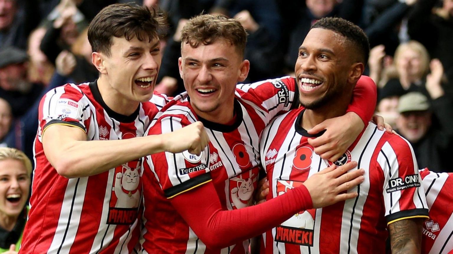 Sheffield United players celebrate Tyrese Campbell's goal against Sheffield Wednesday