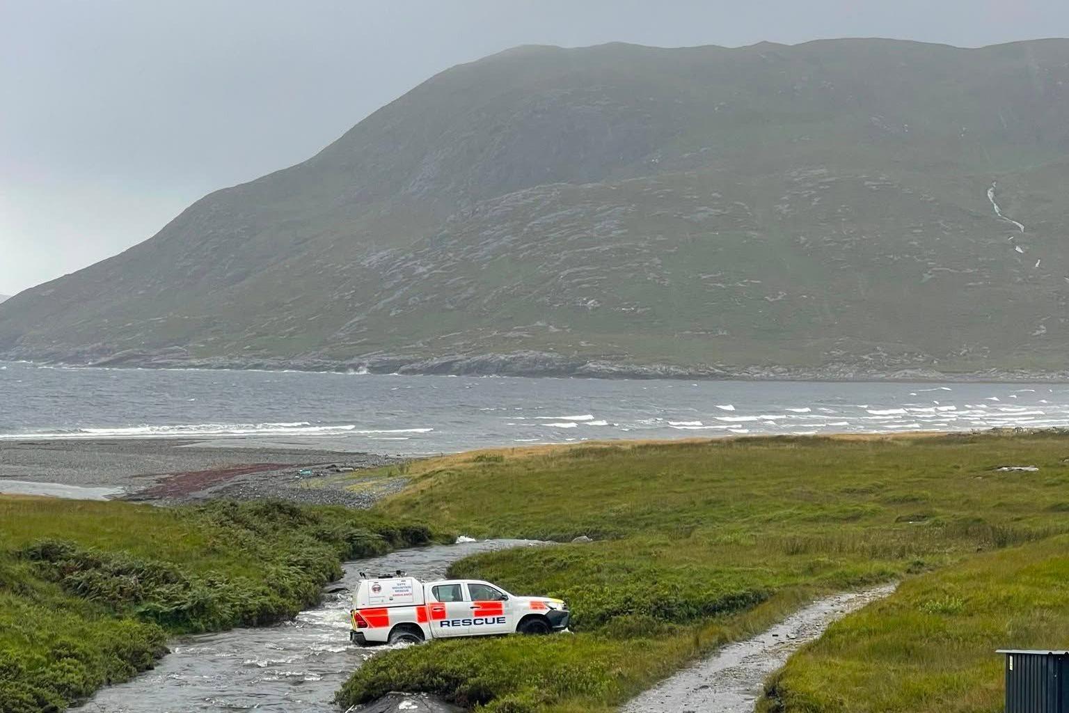 A Skye Mountain Rescue Team drives through a steam during a call out on Friday