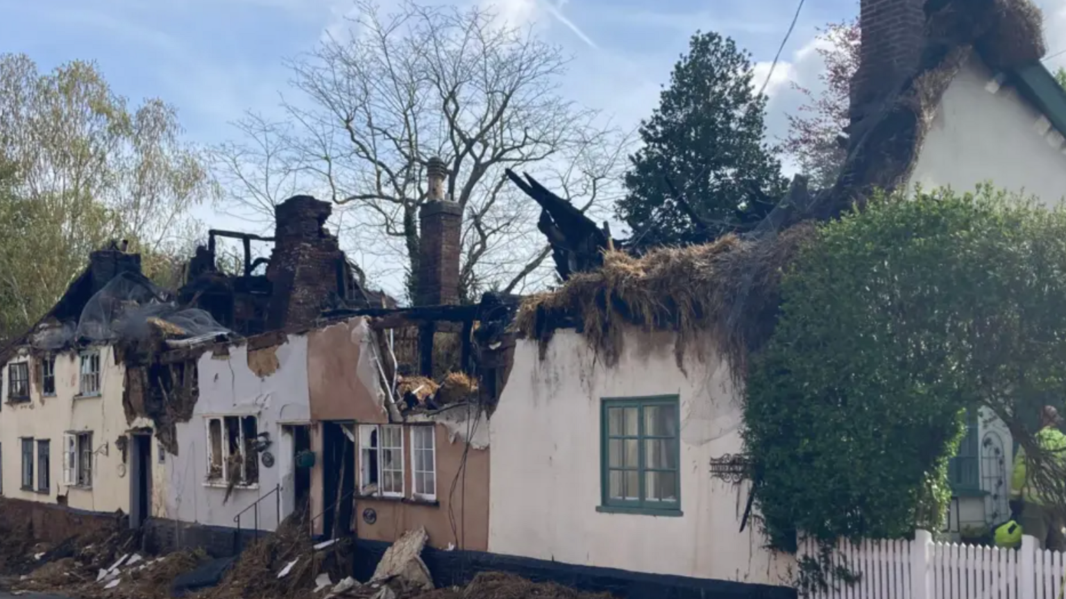 A row of thatched cottages in Bardwell which can be seen badly damaged by a fire