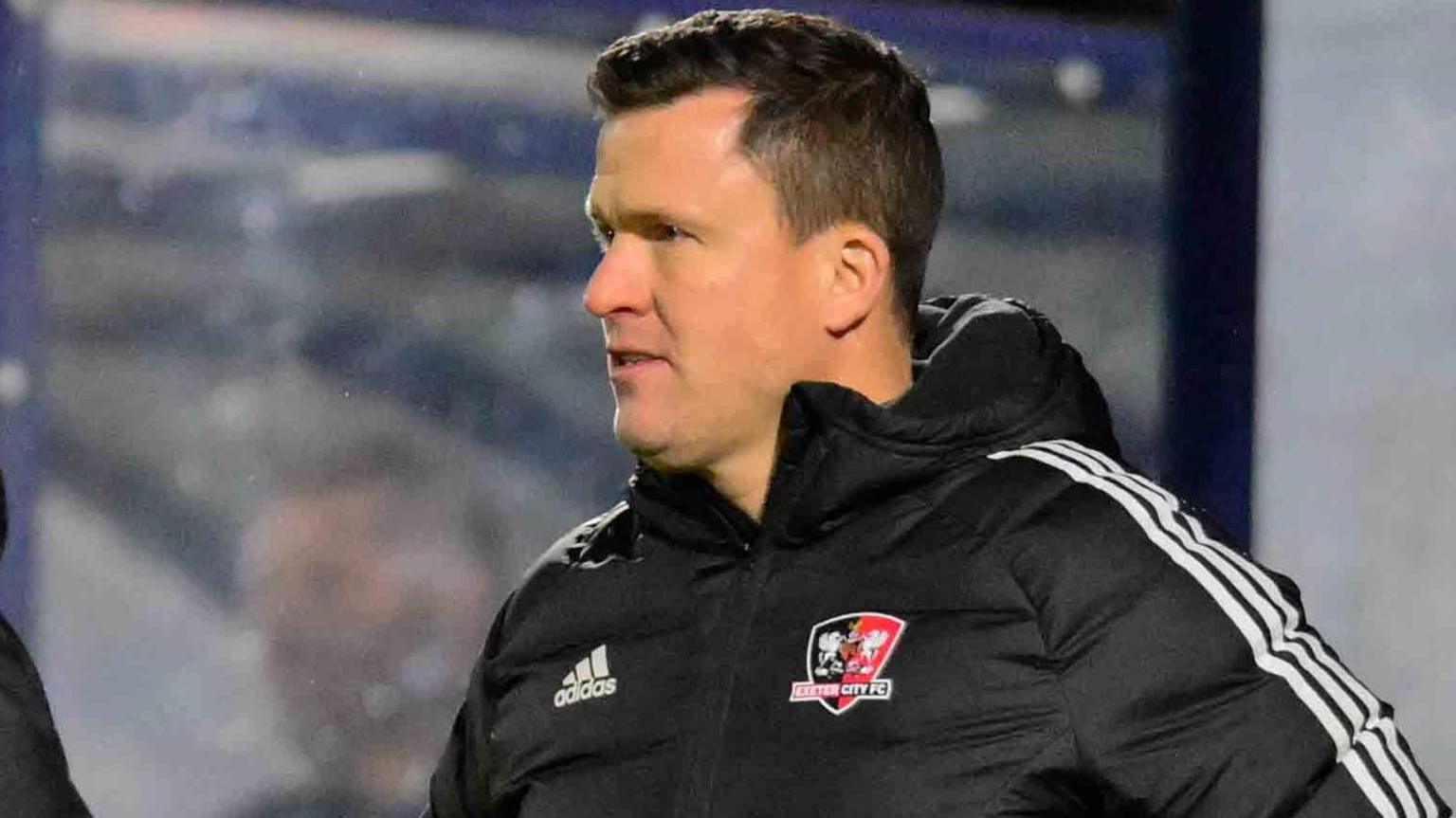 Gary Caldwell looks on during an Exeter game