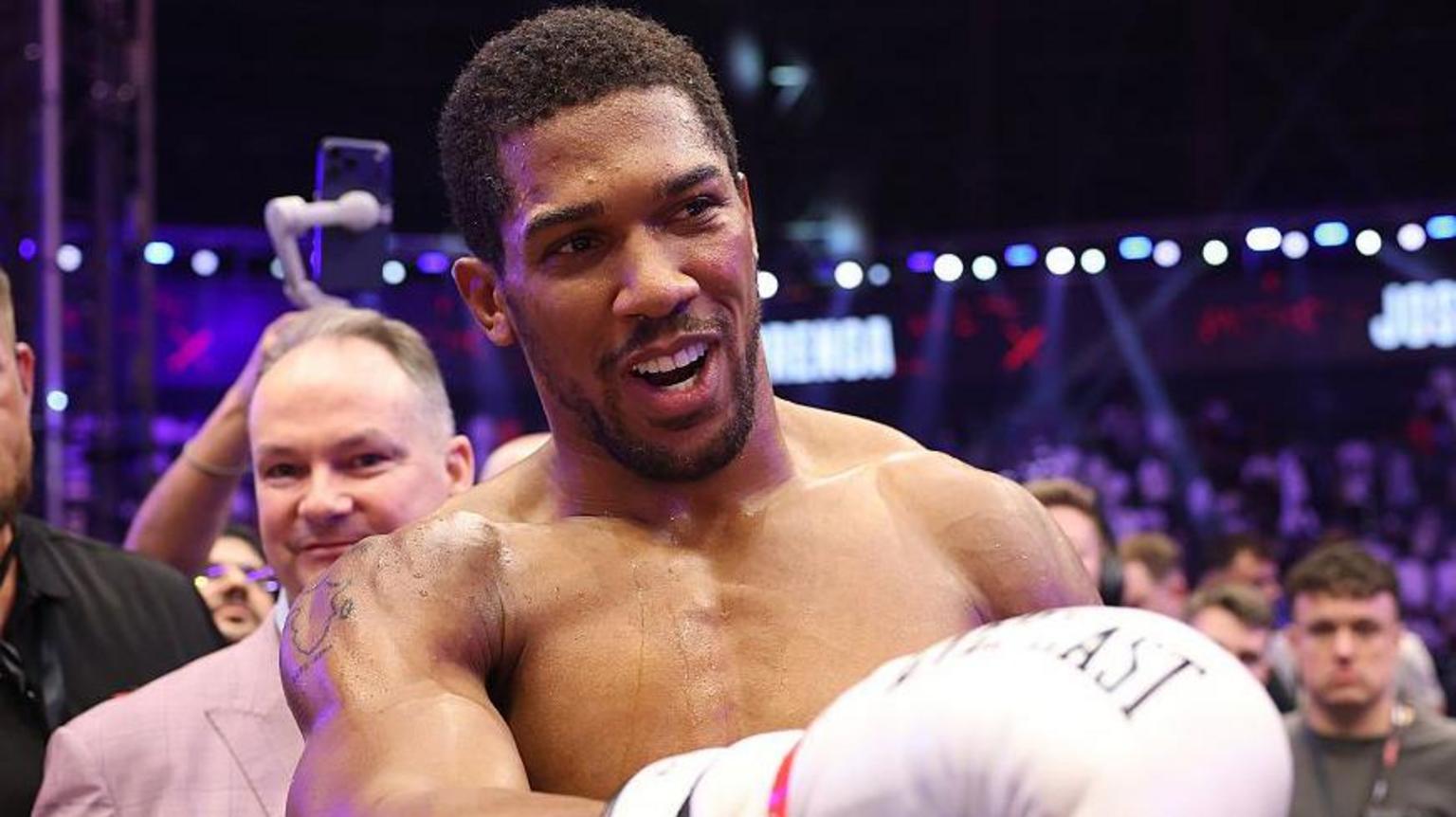 Joshua knocked down twice in dramatic win