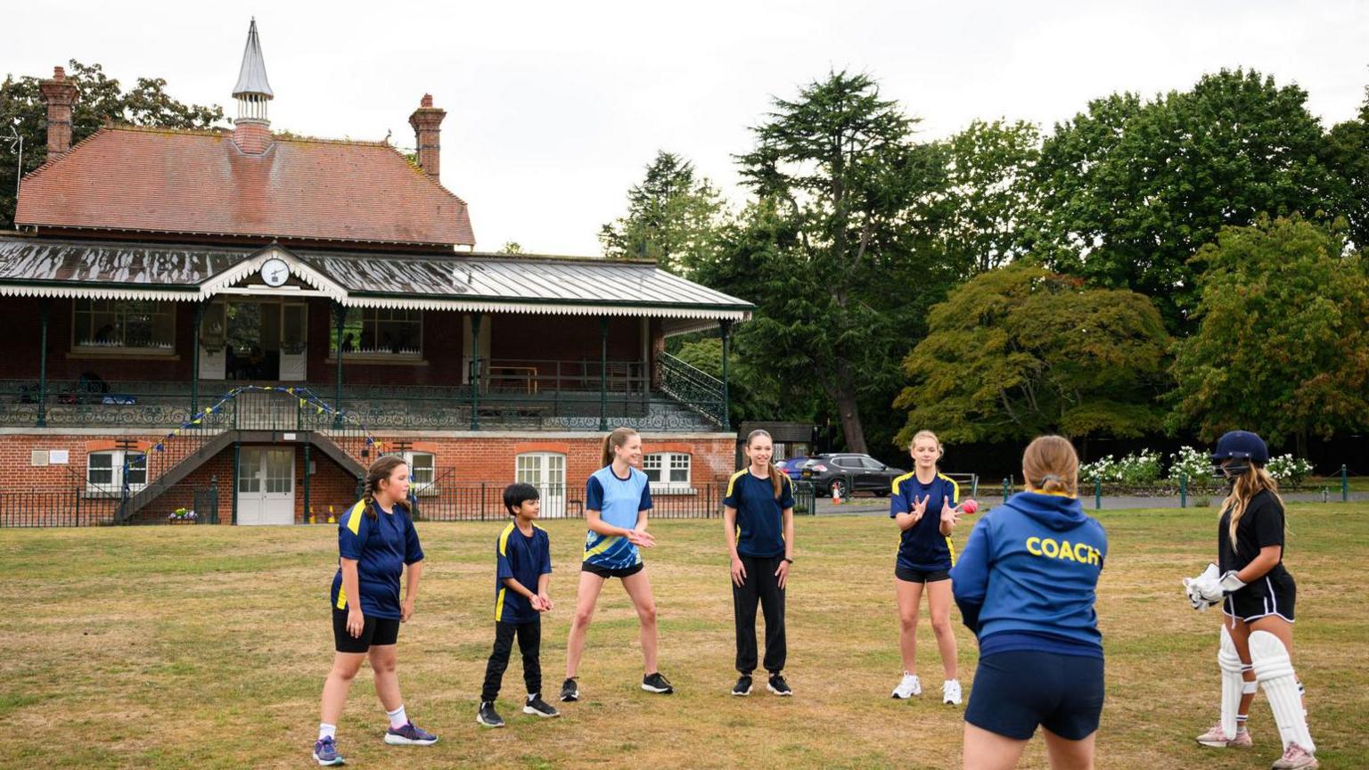 Children take part in mixed cricket coaching session