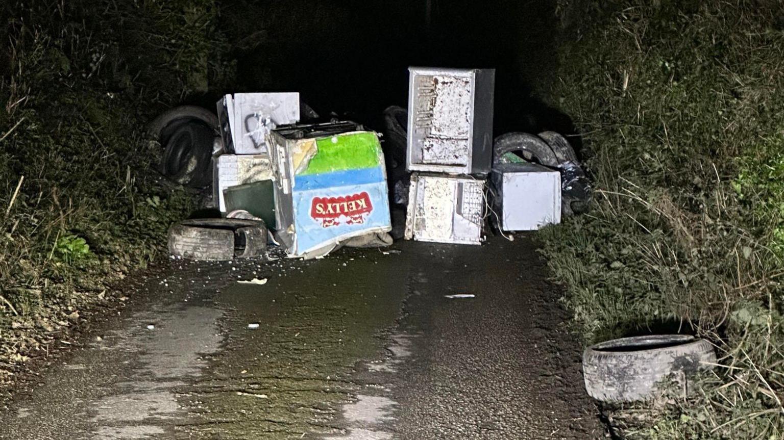 Commercial waste dumped on a road in Cornwall