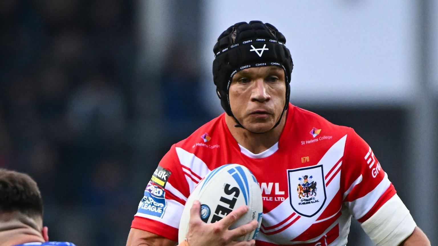 Jonny Lomax in action for St Helens against Warrington Wolves