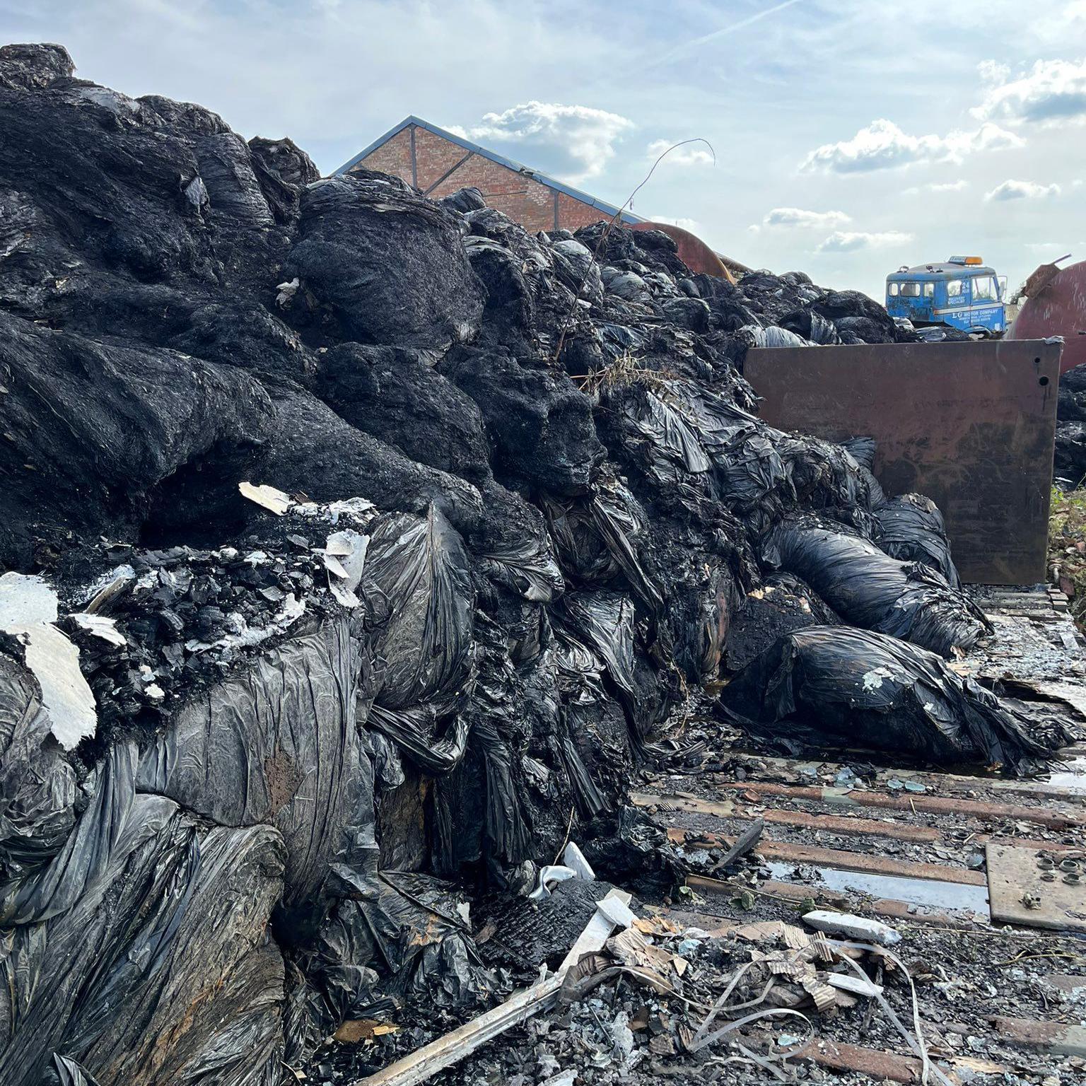 Damaged recycling after a large fire