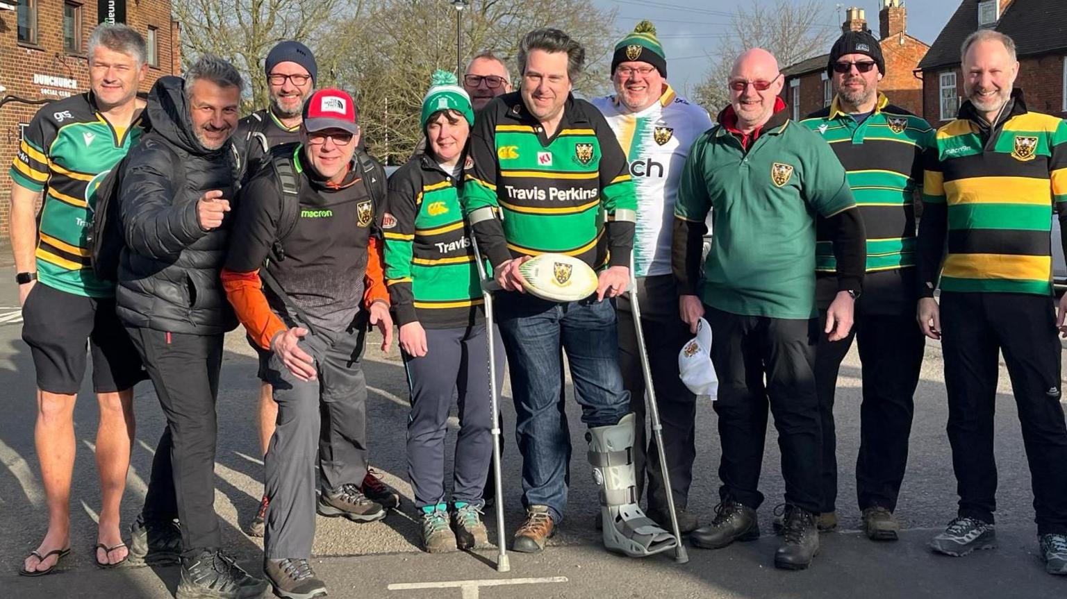 A group of friends in rugby tops 