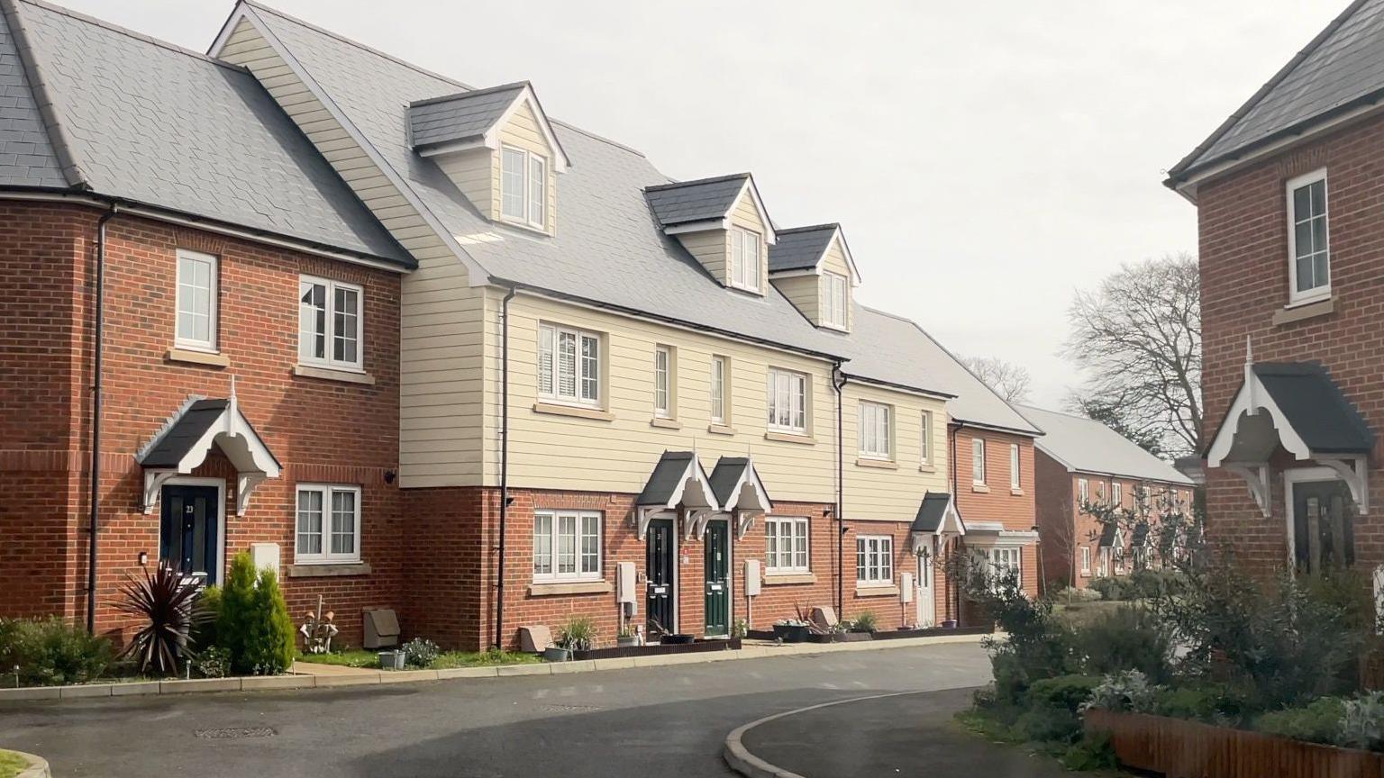 A street view of new homes built by Vivid in Hythe