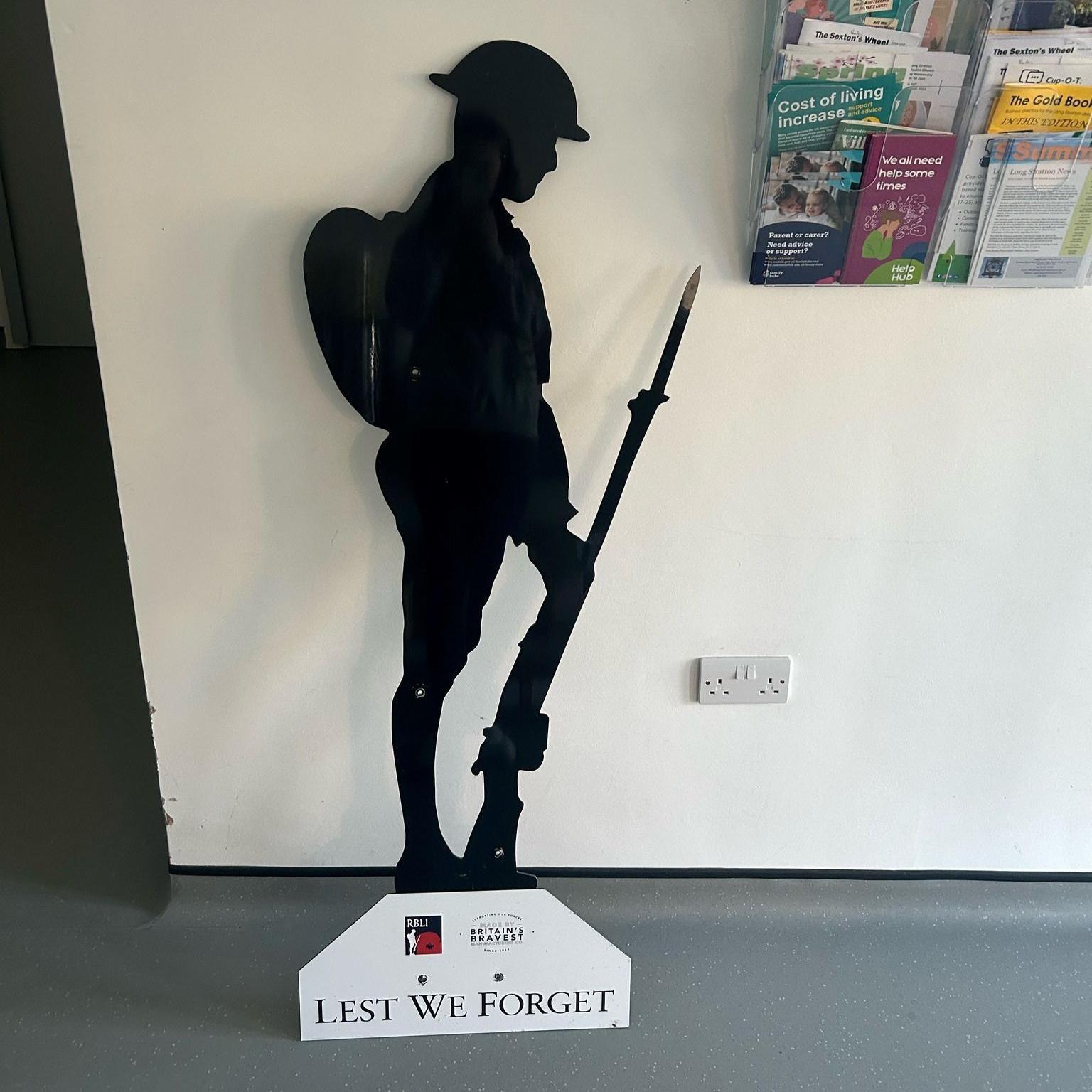 An undmaged silhouette statue of a World War One Tommy