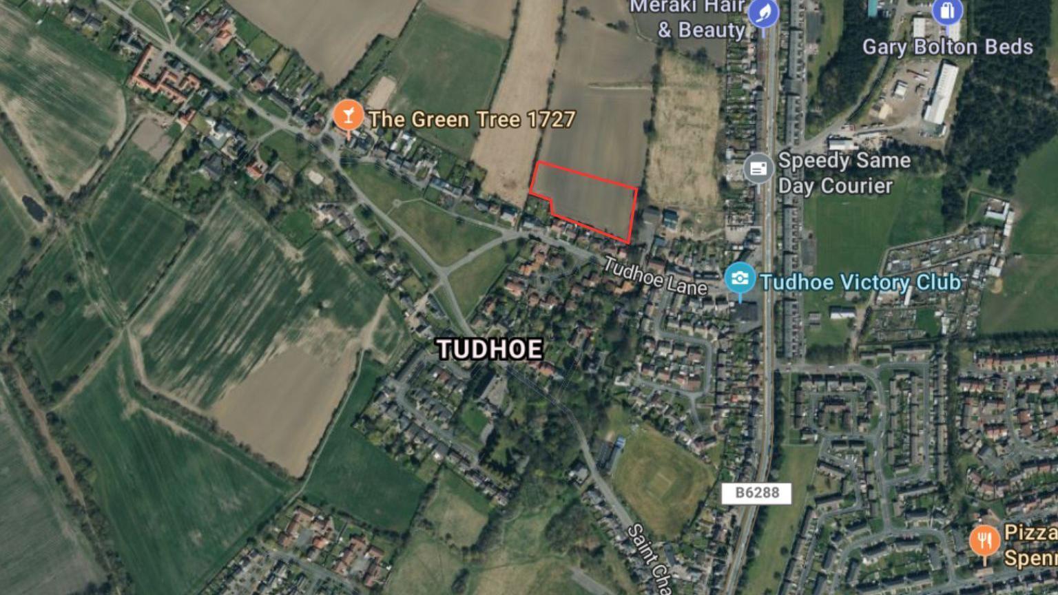 An aerial view of Tudhoe village. The small plot of land behind Tudhoe Lane, where the development would have been, is highlighted in red. 