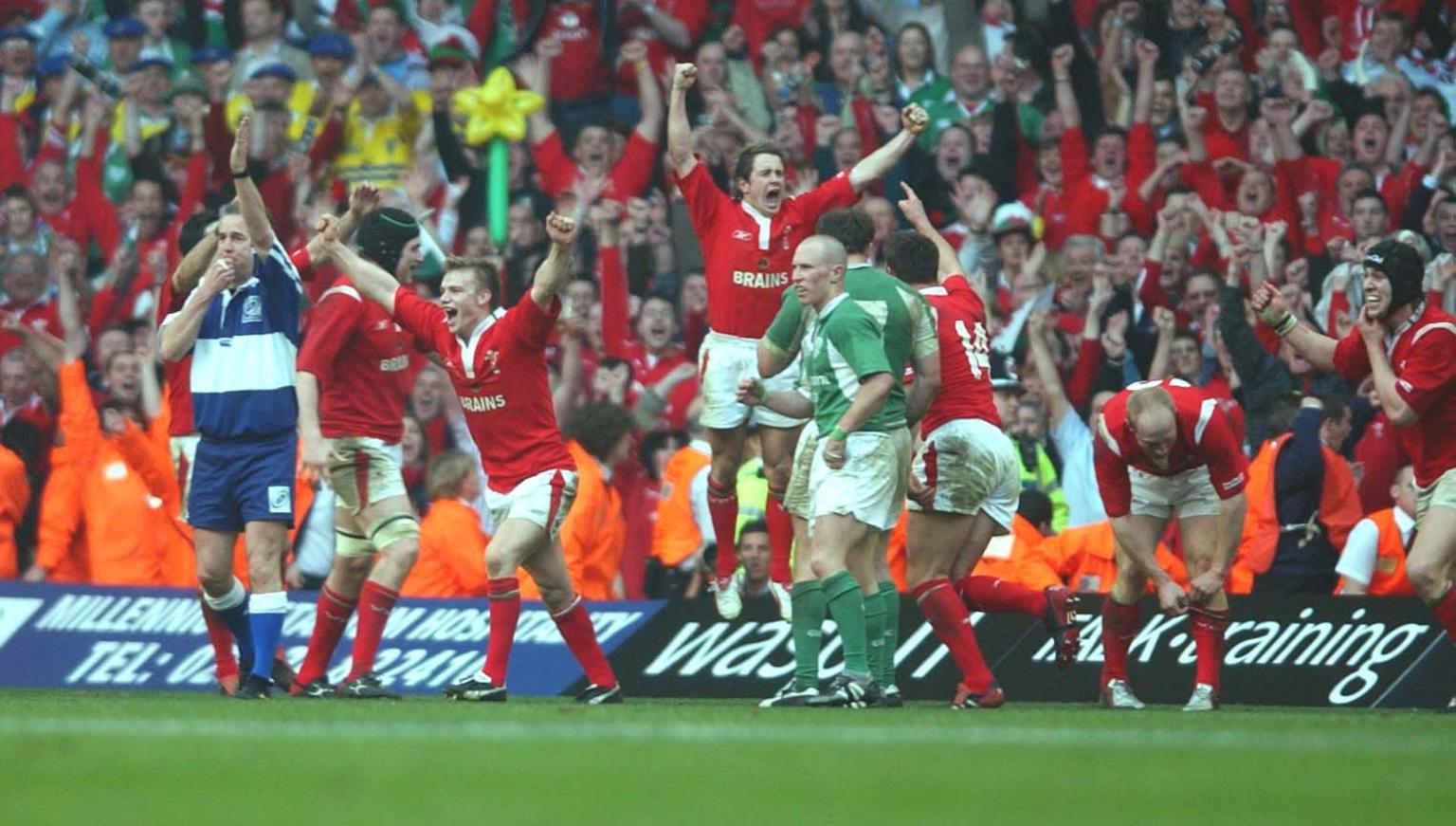 Wales players celebrate at the end of the game against Ireland in 2005