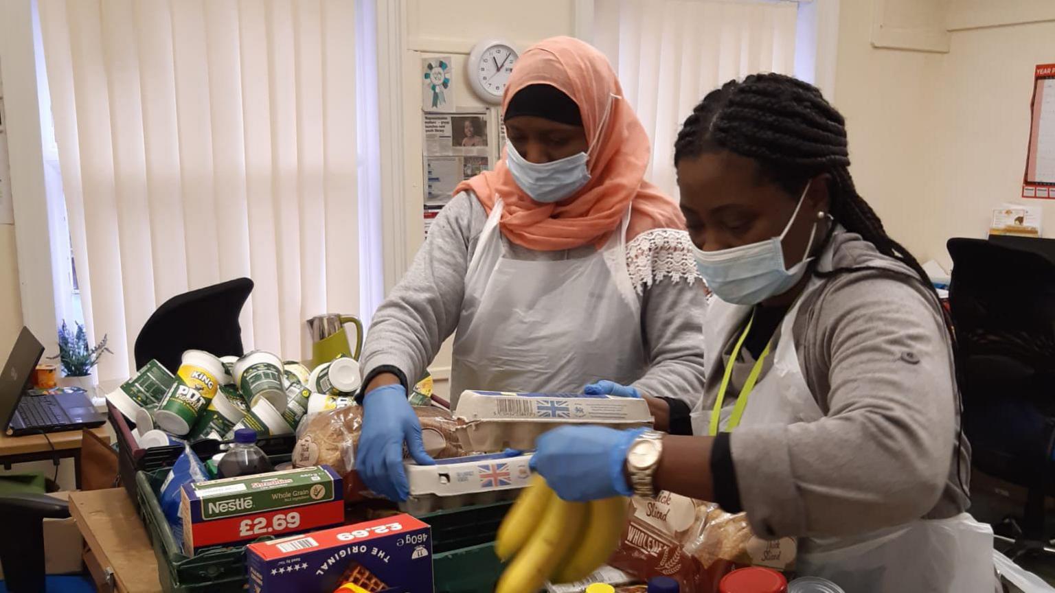 Volunteers working at the BSSG foodbank