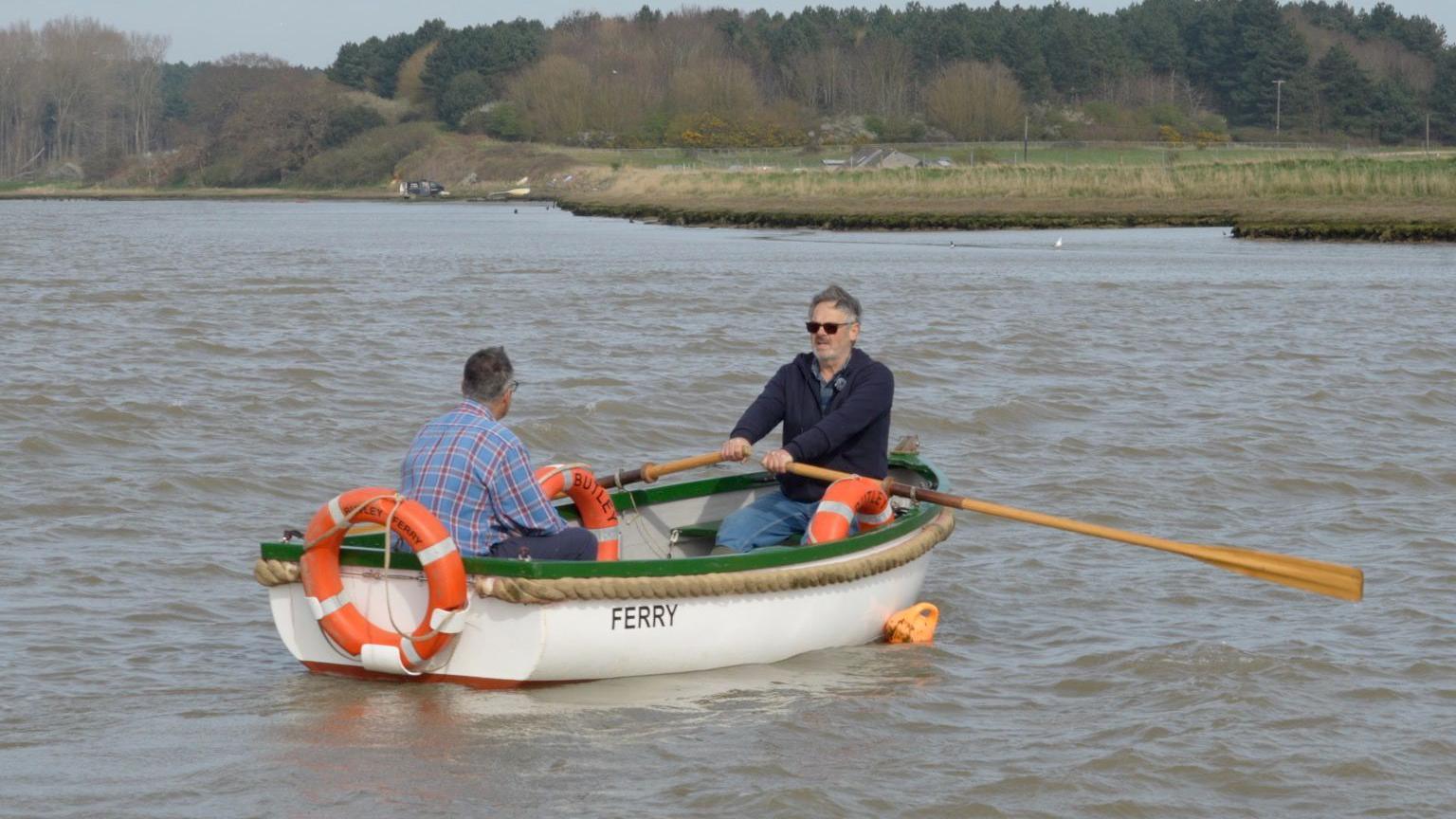 Roy Truman testing the ferry service across the creek