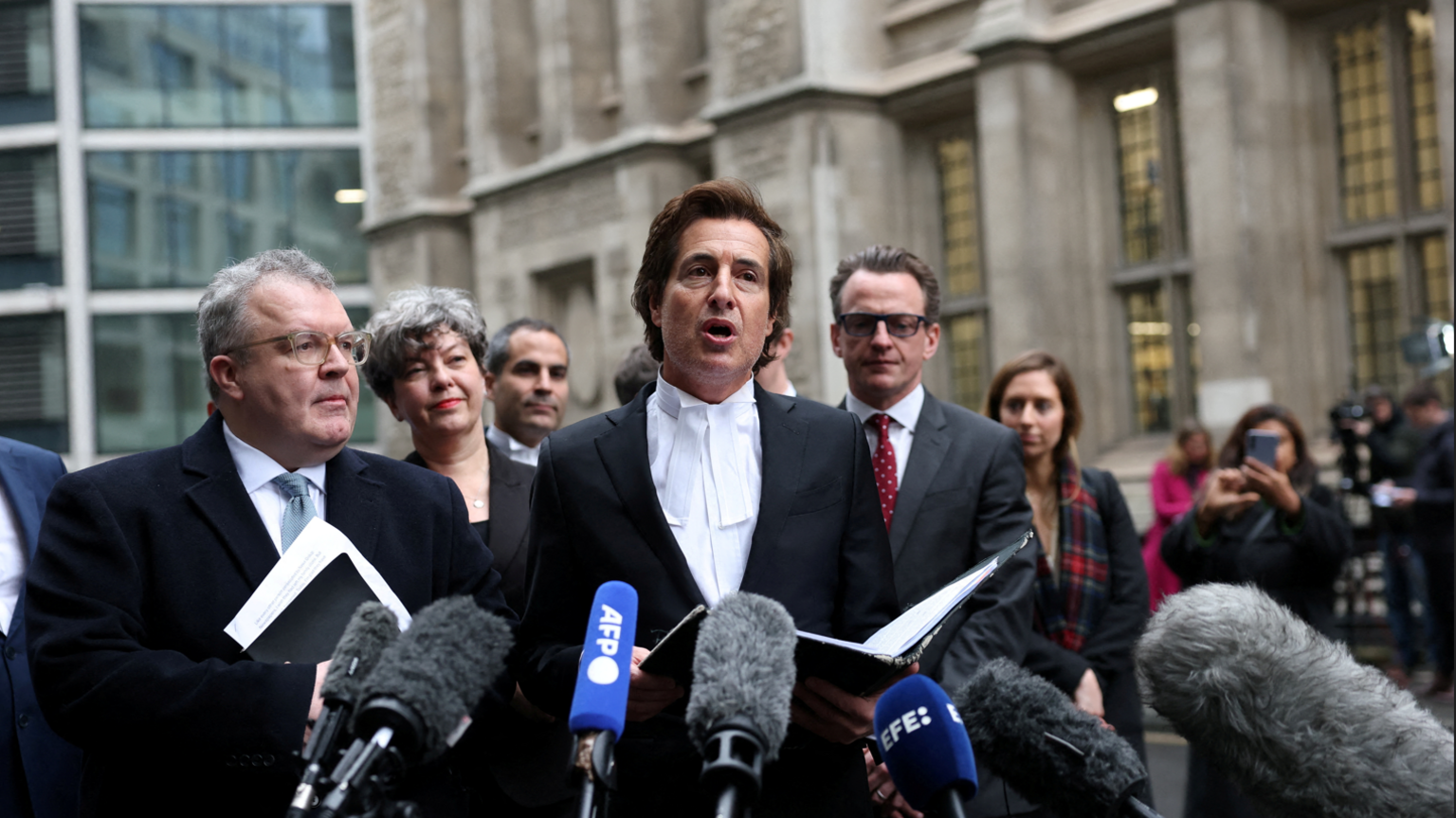 Lawyer David Sherborne flanked by former Deputy Leader of the Labour Party Tom Watson outside the High Court 