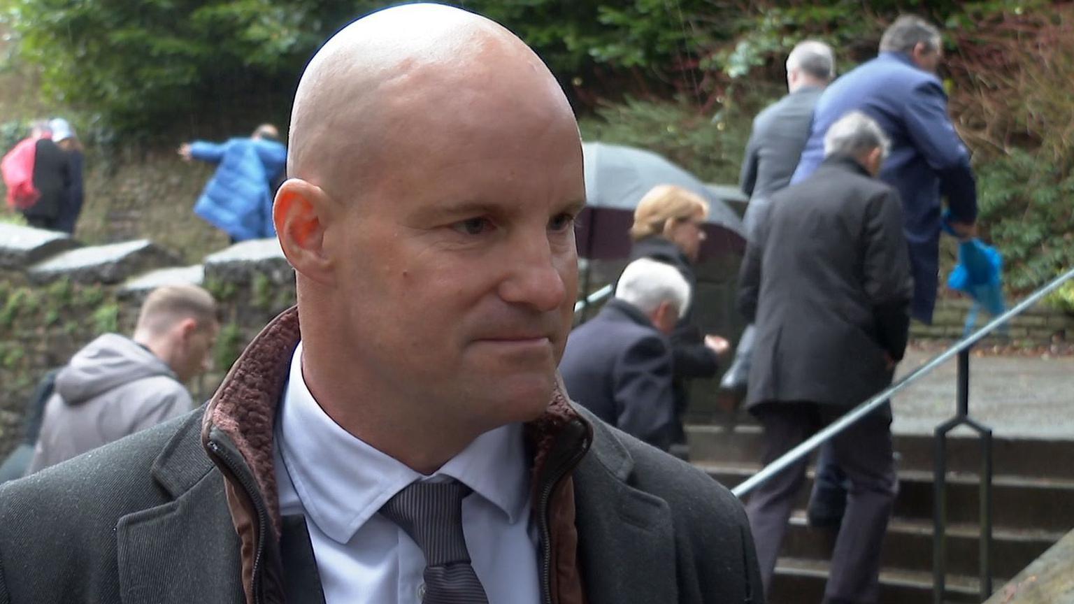 Sir Andrew Strauss outside Llandaff Cathedral where Hugh Morris' funeral took place