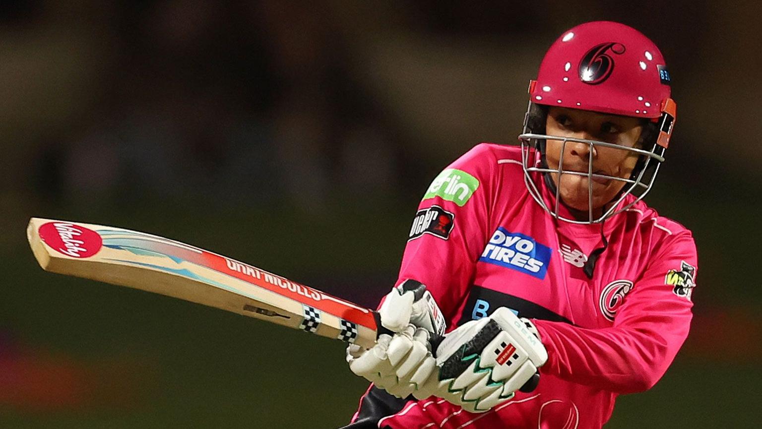 Sophia Dunkley plays a shot