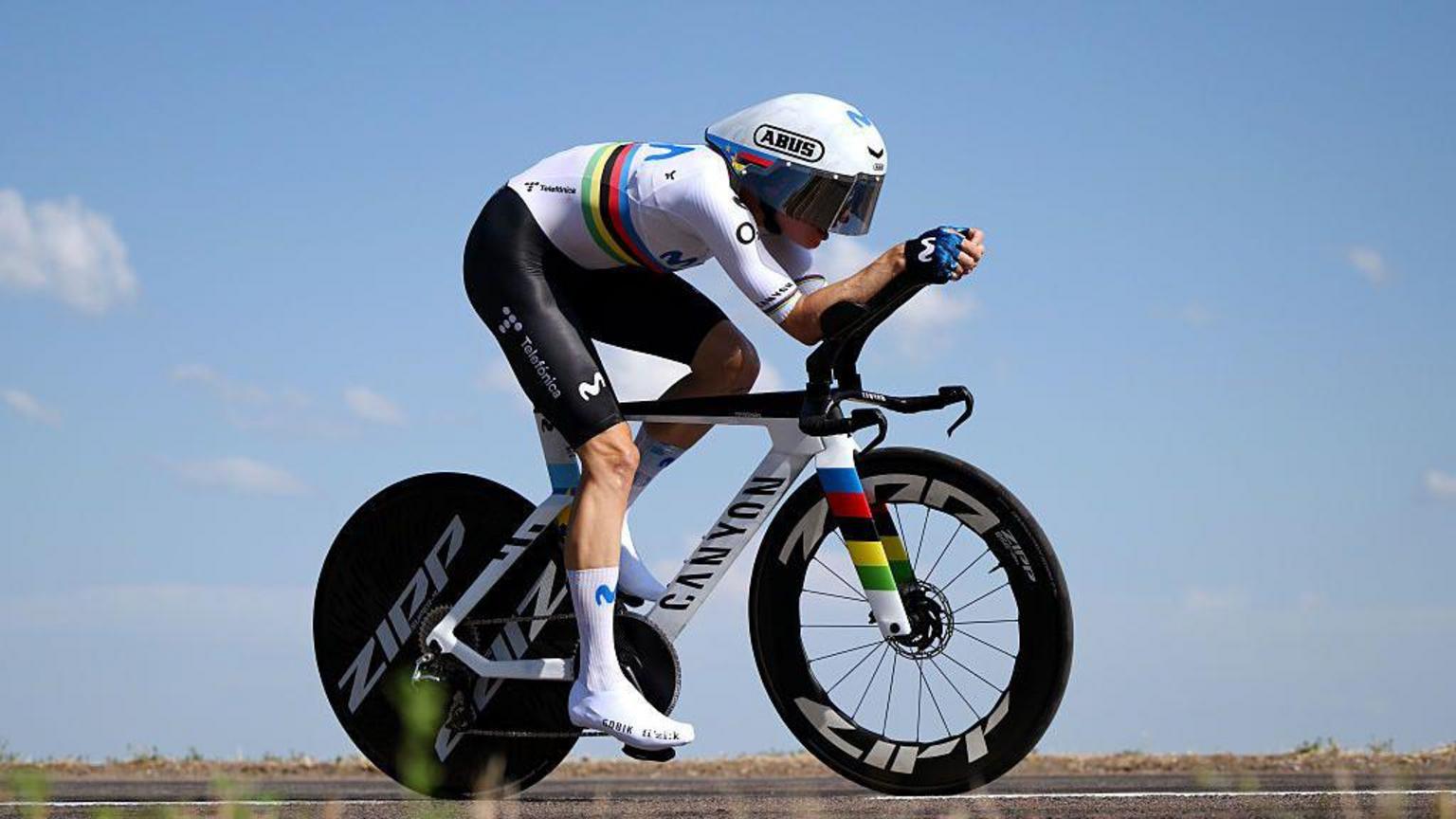 Reusser takes Tour lead with time trial win