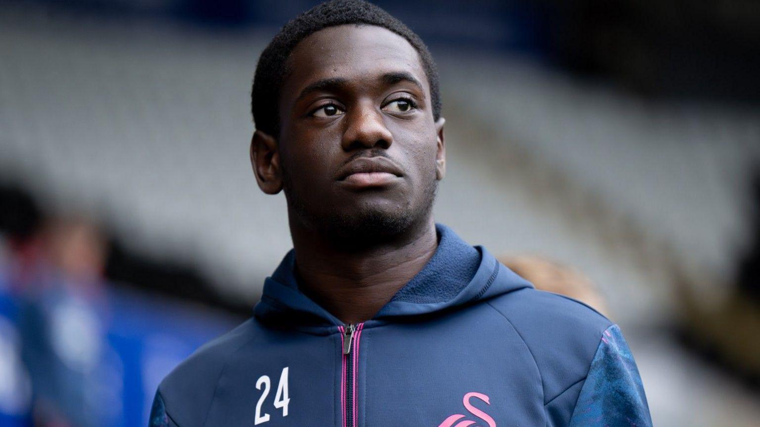 Charles Sagoe Jr warming up for Swansea City