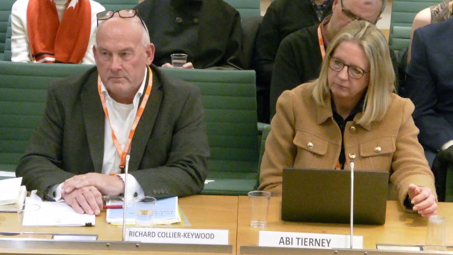 Welsh Rugby Union chair Richard Collier-Keywood sitting in front of politicians in parliament
