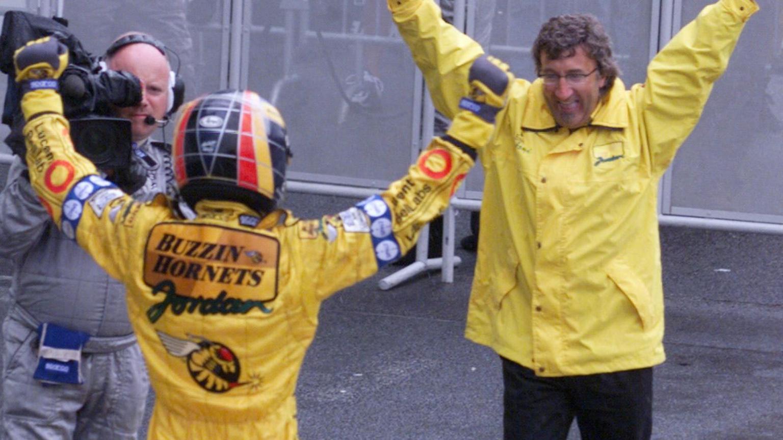 Eddie Jordan and Heinz-Harald Frentzen celebrate a victory