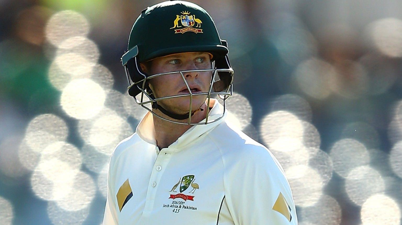 Steve Smith looks back after being dismissed