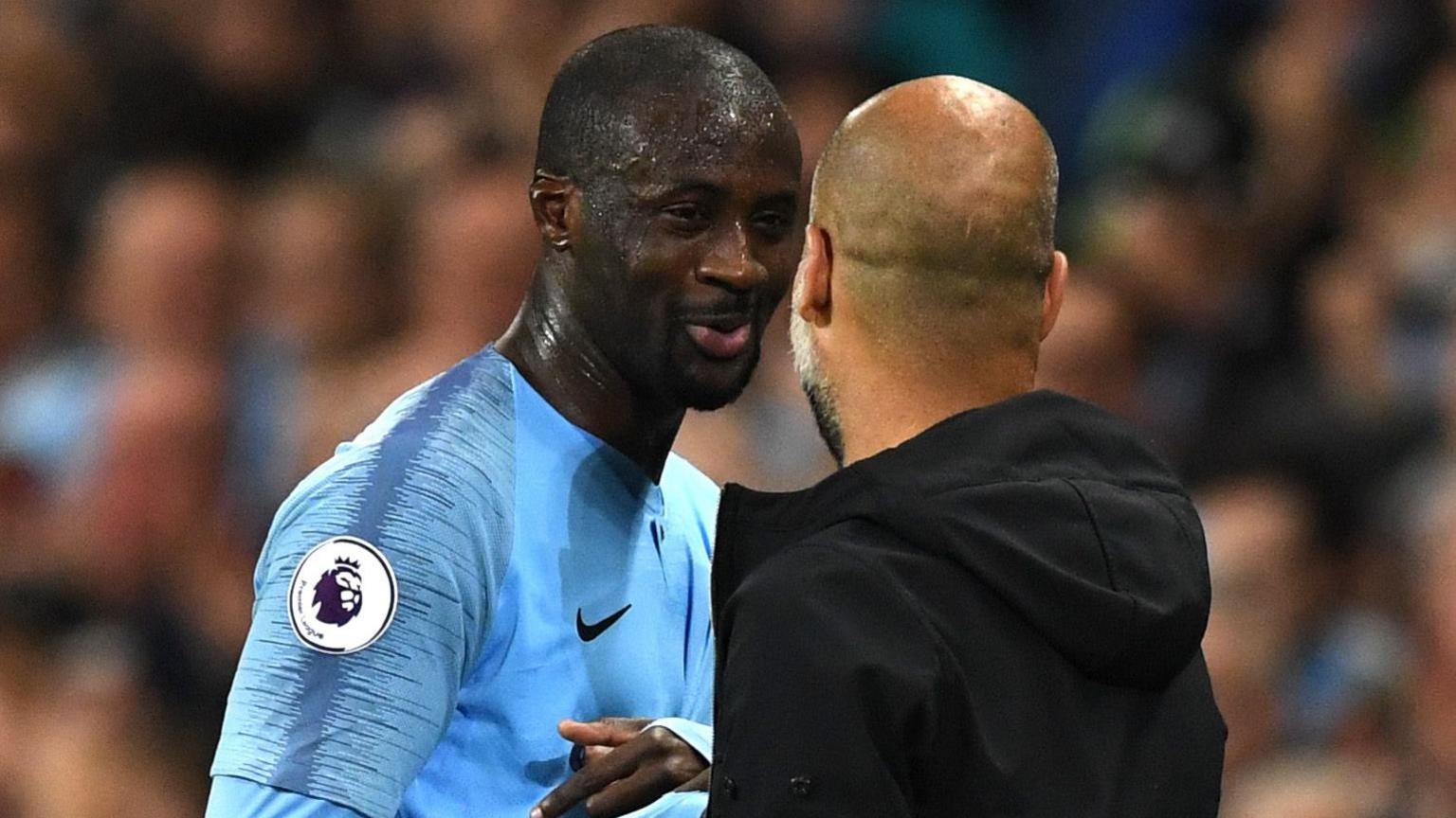 Pep Guardiola with Yaya Toure