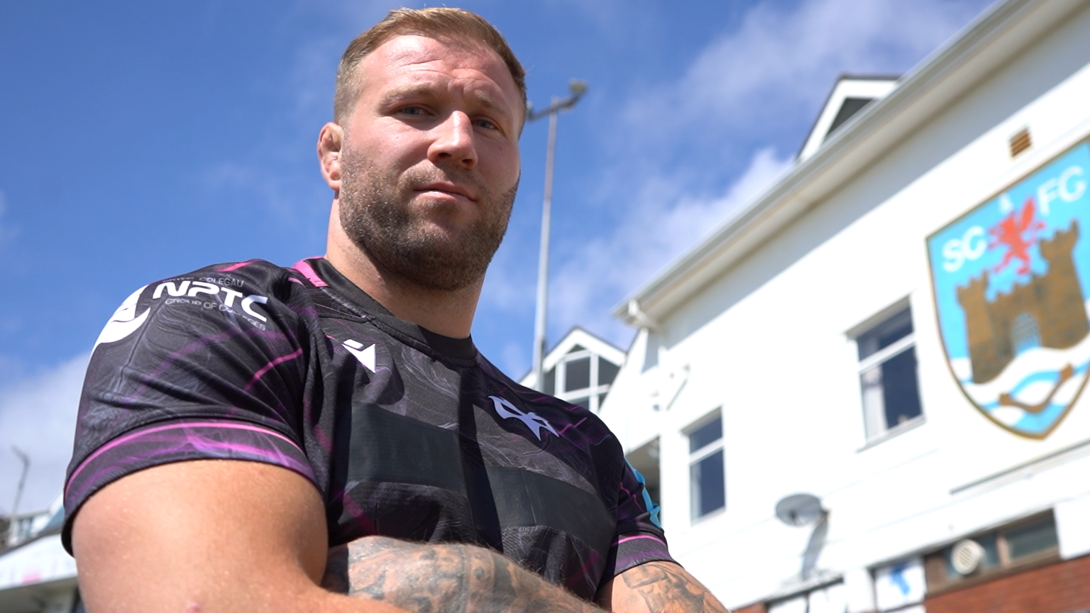 Ross Moriarty posing in an Ospreys shirt
