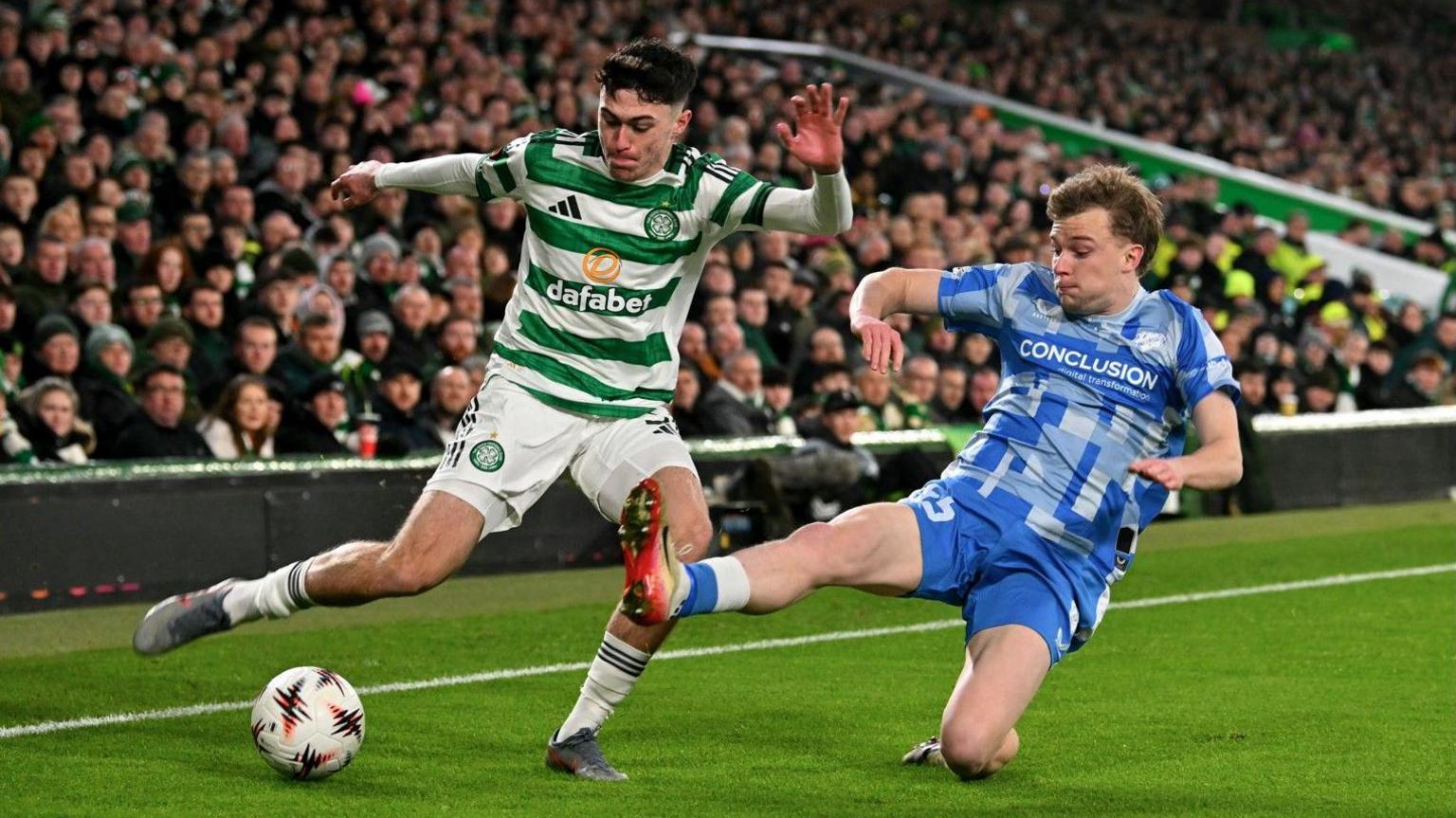 Celtic's Colby Donovan and Utrecht's Derry John Murkin battle for the ball during the UEFA Europa League match at Celtic Park, Glasgow