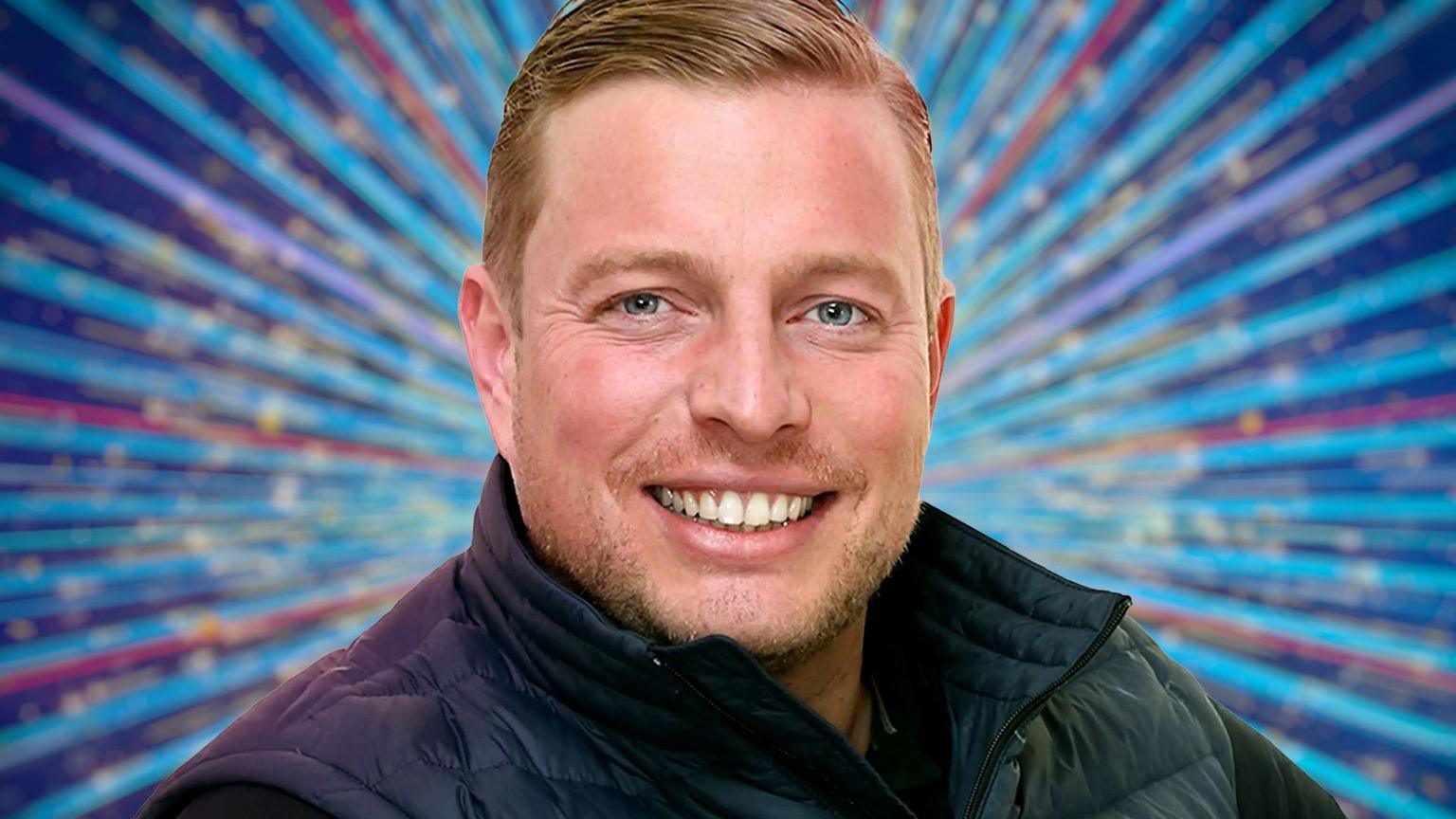 Thomas Skinner wearing a black gilet in a Strictly publicity photo