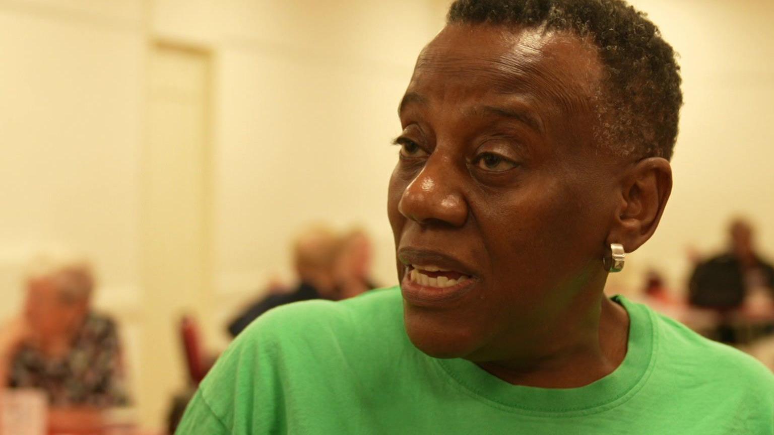 Darlene Torey in a green t-shirt.