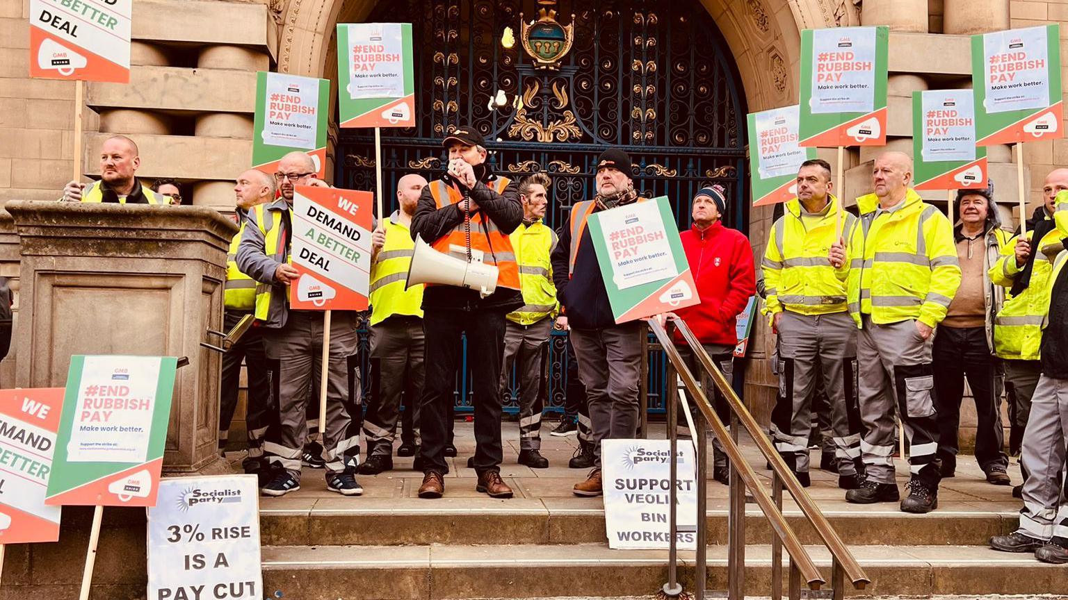 Refuse collectors striking outside Sheffield Town Hall